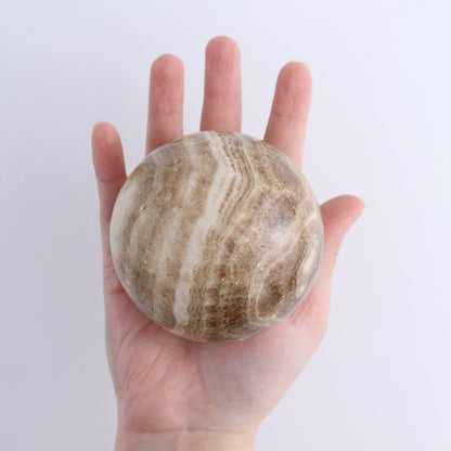 One Mexican Onyx/Calcite Chocolate Sphere 8 cm