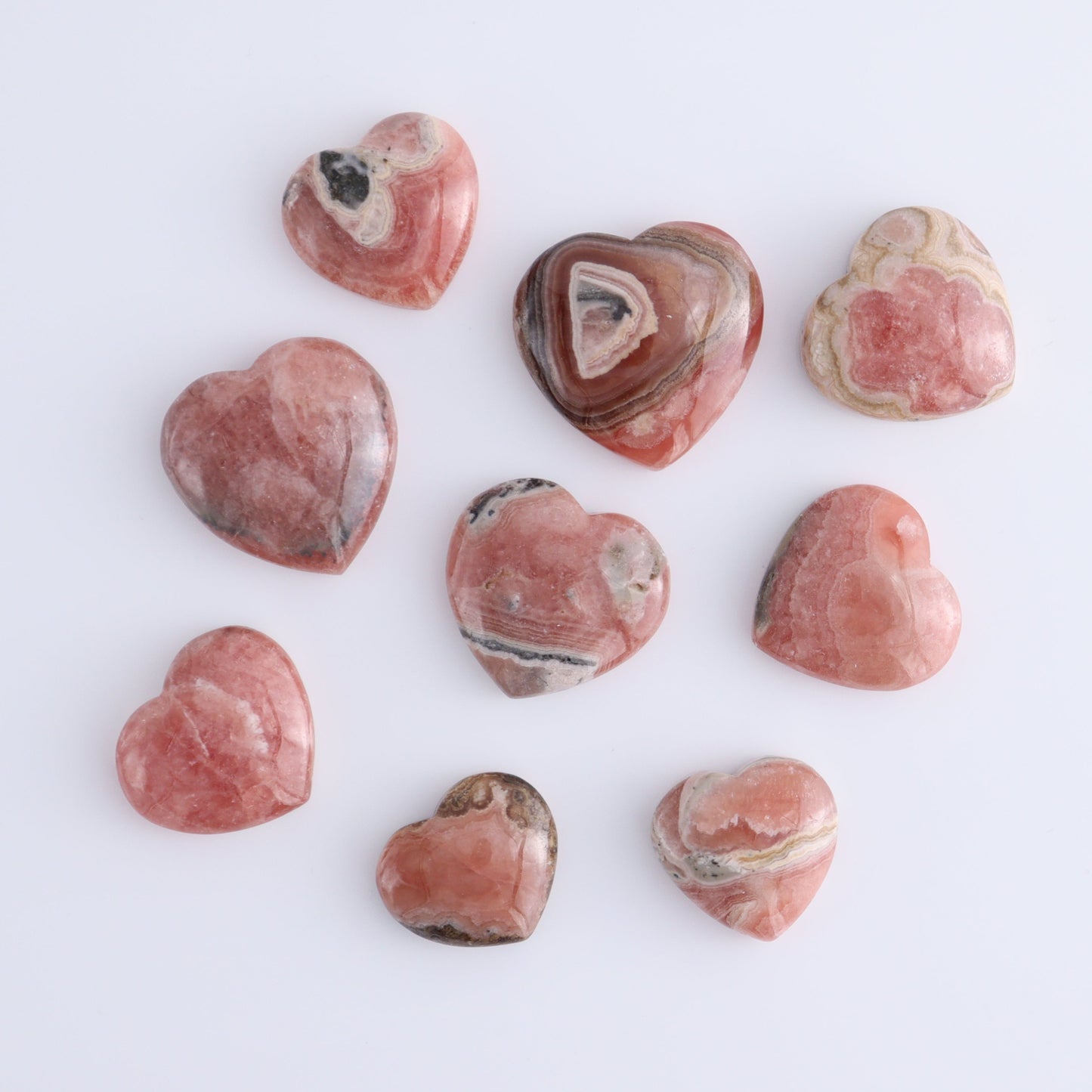 Rhodochrosite Hearts Set of 9 - Expert Wholesale and Supplier of Wholesale Crystals & Bulk Gemstones, ["Argentina","Hearts","Rhodochrosite"]