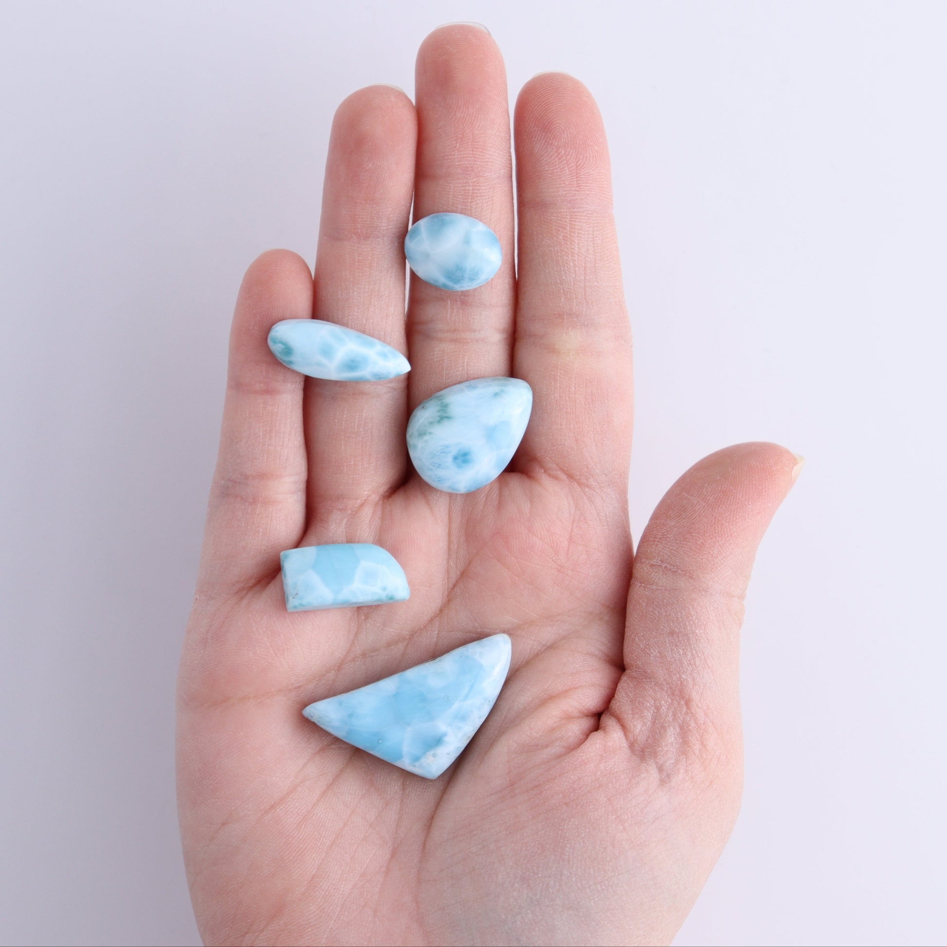 Larmiar Cabs Set of 8 - Expert Wholesale and Supplier of Wholesale Crystals & Bulk Gemstones, ["Cabs","Freeform","Freeforms","Larimar"]