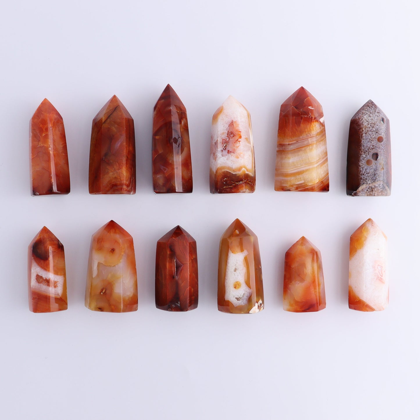 Carnelian Towers Set of 12 - Expert Wholesale and Supplier of Wholesale Crystals & Bulk Gemstones, ["carnelian","Madagascar","Towers"]
