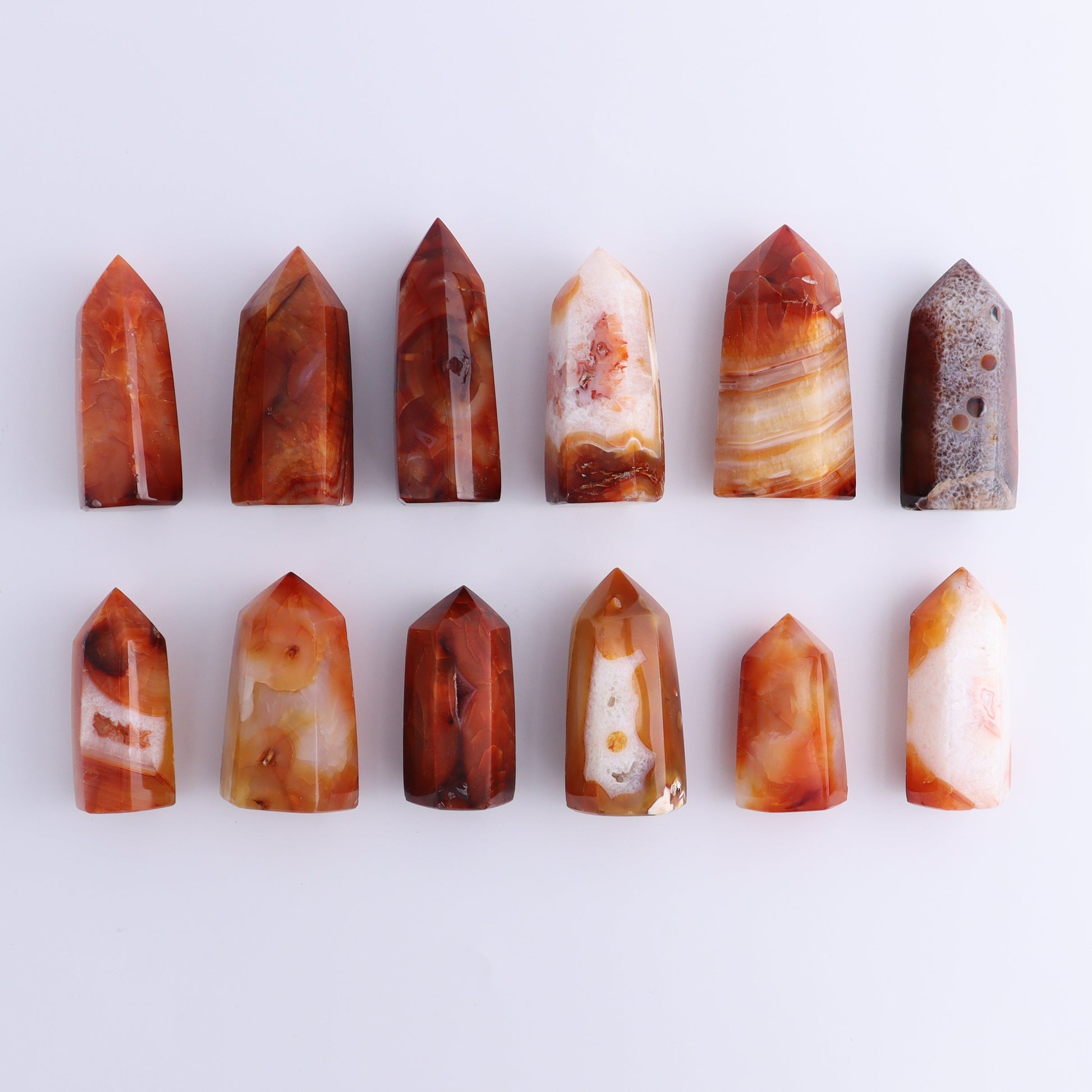 Carnelian Towers Set of 12 - Expert Wholesale and Supplier of Wholesale Crystals & Bulk Gemstones, ["carnelian","Madagascar","Towers"]