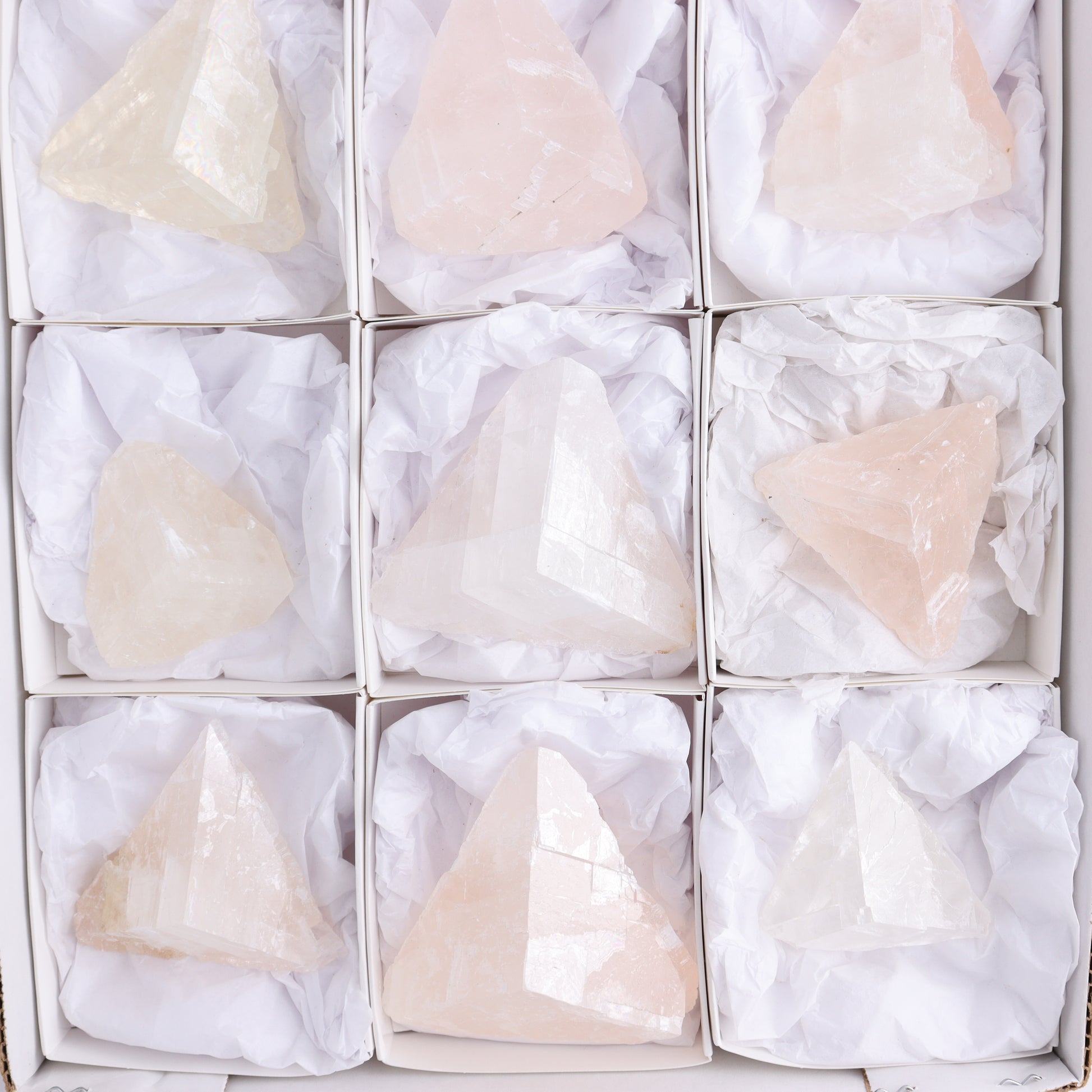 Pink Optical Calcite (Fluorescent) Set of 12 - Expert Wholesale and Supplier of Wholesale Crystals & Bulk Gemstones, ["Calcite","Mexico","Optical Calcite"]