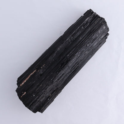 Black Tourmaline Log - Expert Wholesale and Supplier of Wholesale Crystals & Bulk Gemstones, ["Black Tourmaline","logs","Madagascar","Rough","Tourmaline"]