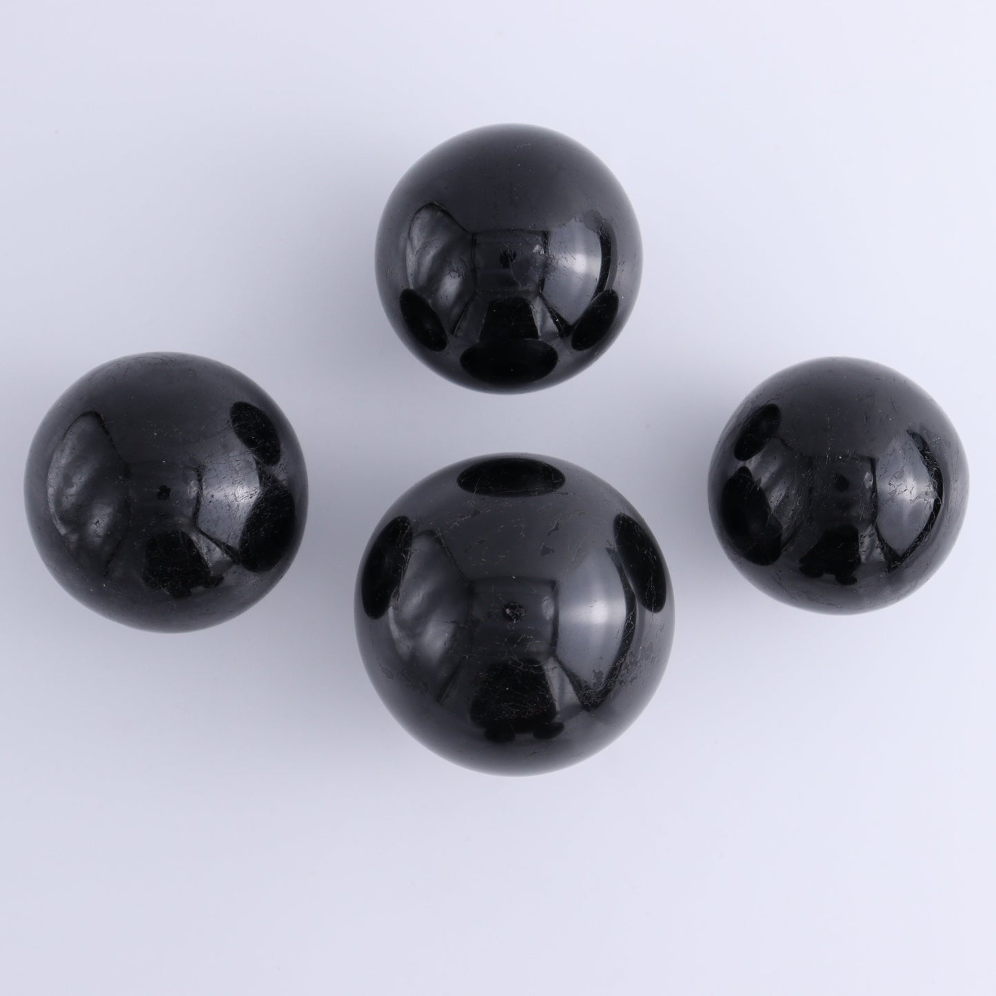 Black Tourmaline Spheres Set of 6 - Expert Wholesale and Supplier of Wholesale Crystals & Bulk Gemstones, ["Black Tourmaline","Spheres","Tourmaline"]