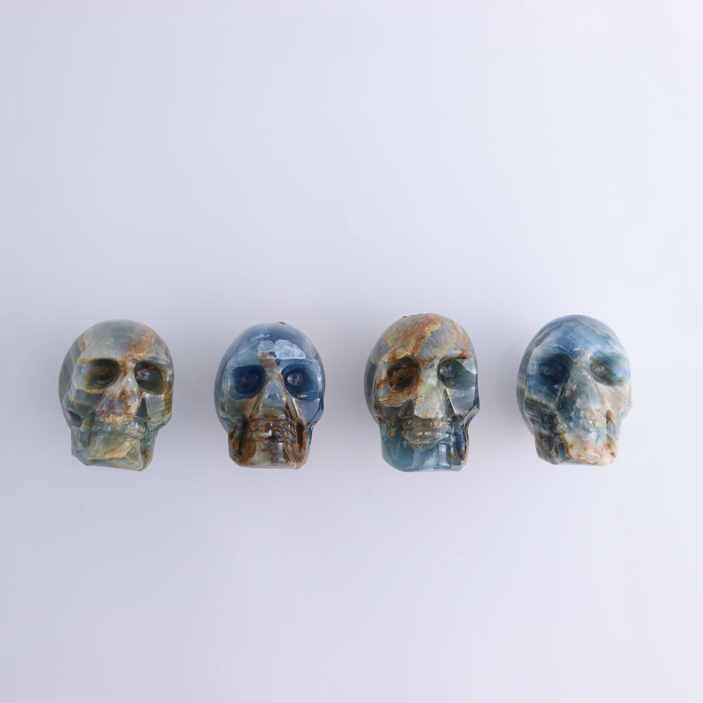 Onyx Skulls Set of 4 - Expert Wholesale and Supplier of Wholesale Crystals & Bulk Gemstones, ["Mexico","onyx","Skulls"]
