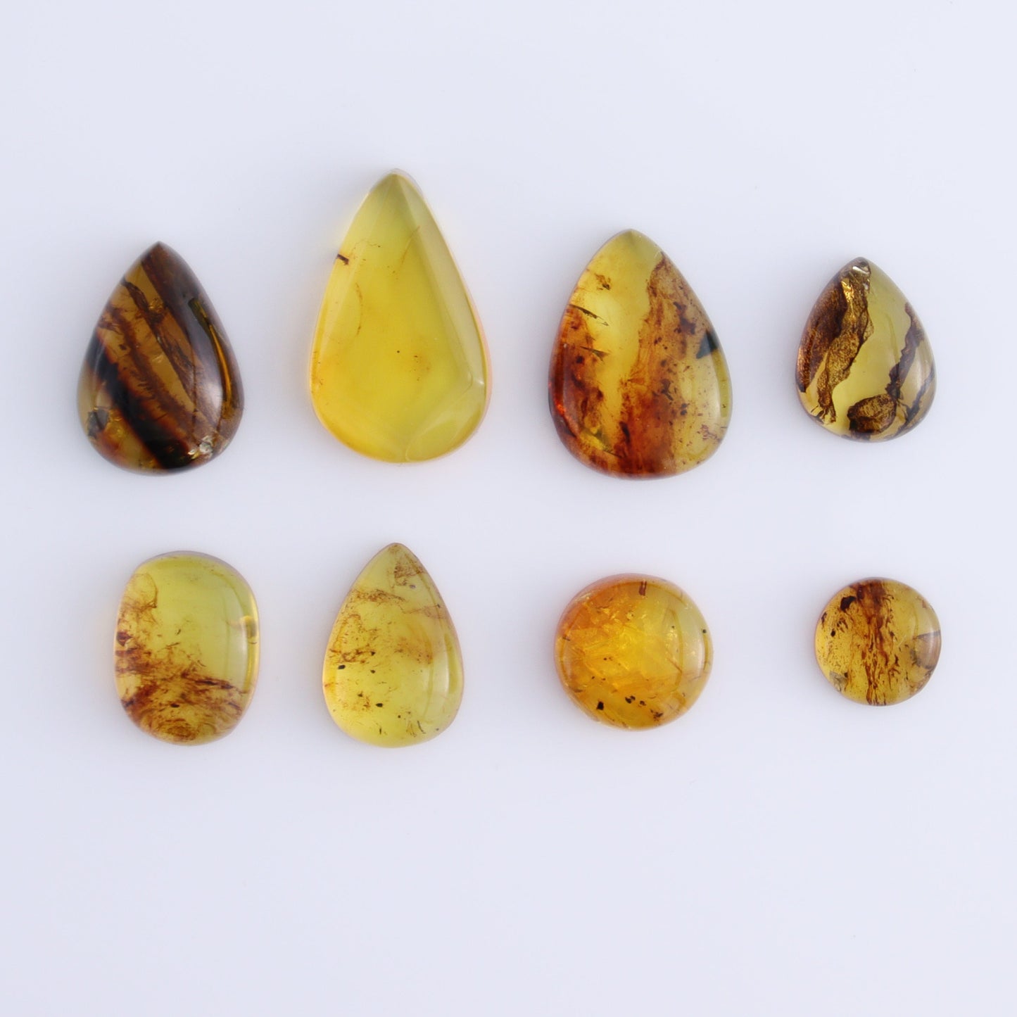 Chiapas Mexico Amber Cabs Set of 8 - Expert Wholesale and Supplier of Wholesale Crystals & Bulk Gemstones, ["Amber","Cabs","Chiapas Amber","Mexico"]