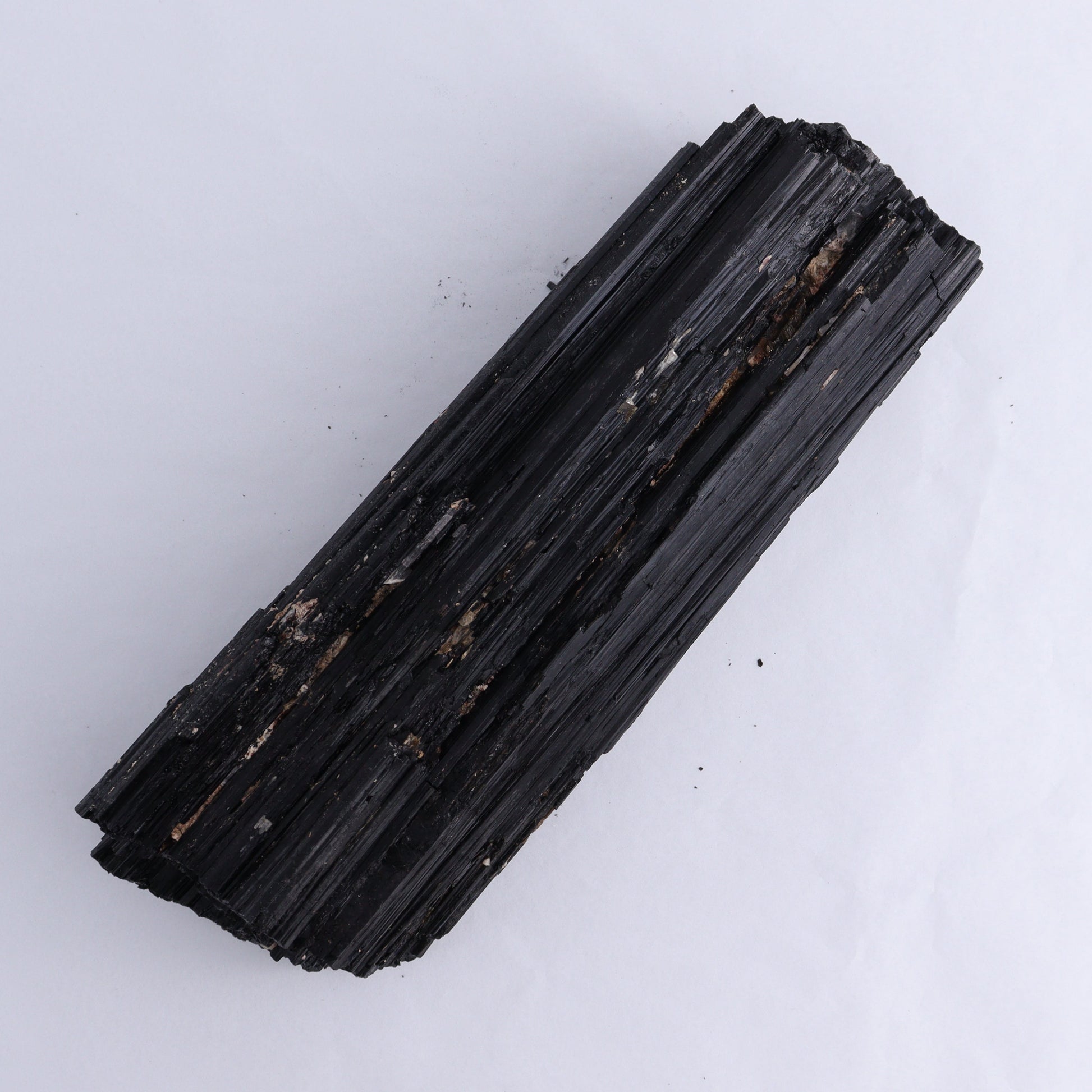 Black Tourmaline Log - Expert Wholesale and Supplier of Wholesale Crystals & Bulk Gemstones, ["Black Tourmaline","logs","Madagascar","Rough","Tourmaline"]