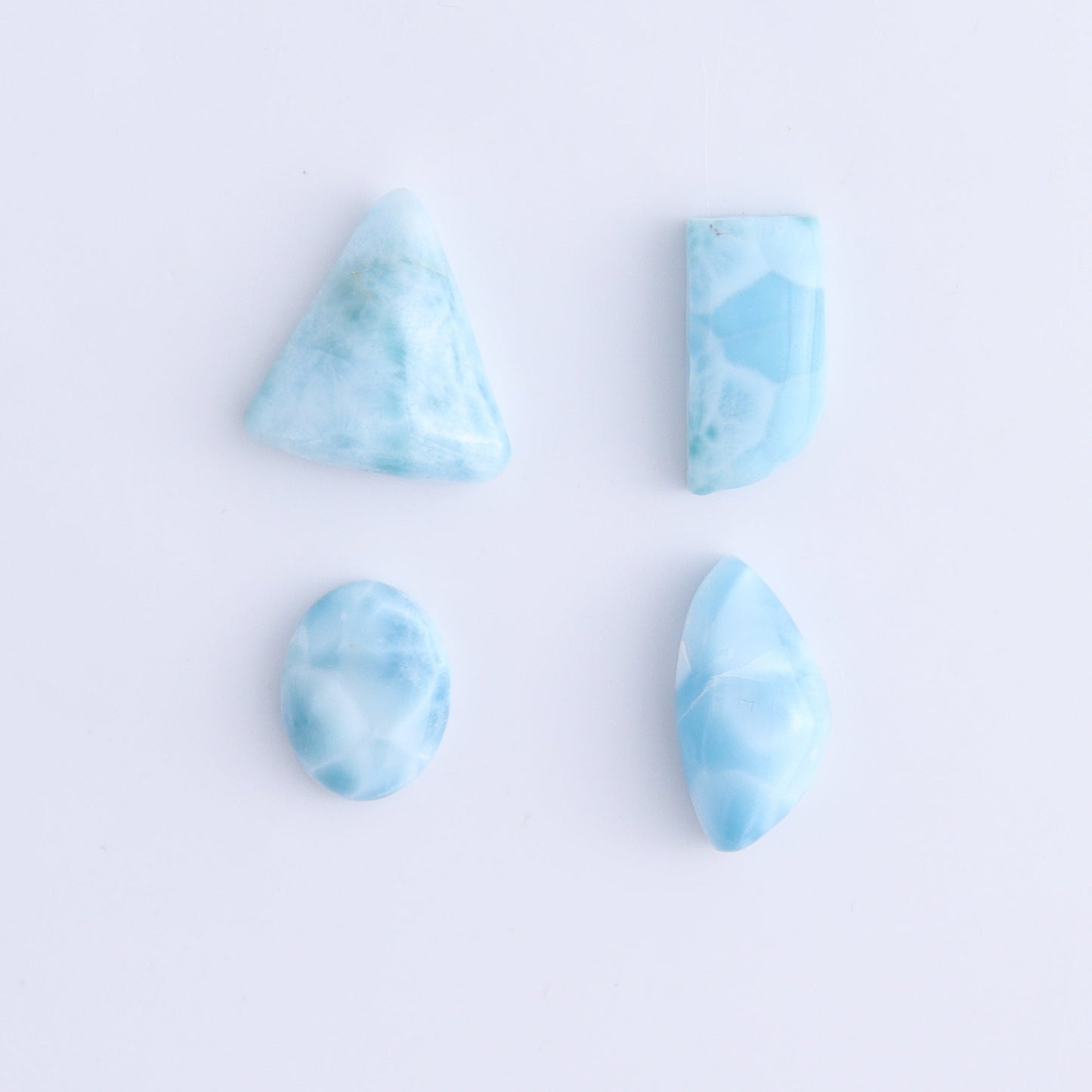 Larmiar Cabs Set of 8 - Expert Wholesale and Supplier of Wholesale Crystals & Bulk Gemstones, ["Cabs","Freeform","Freeforms","Larimar"]