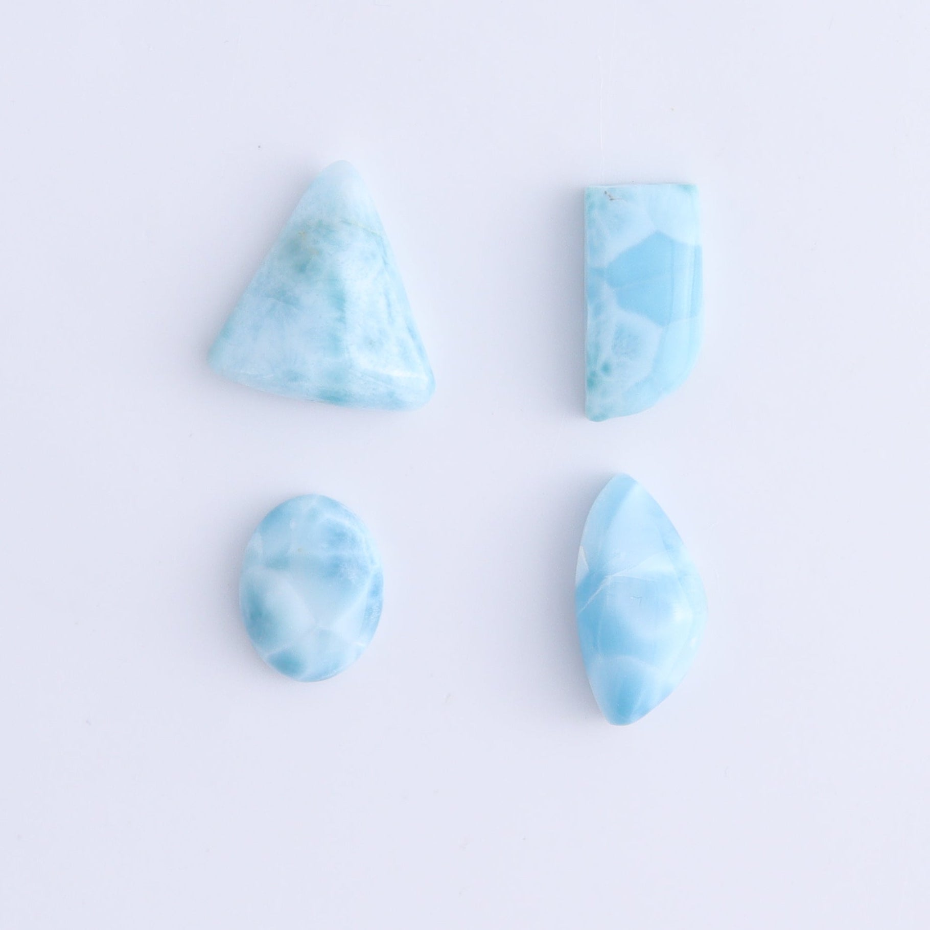 Larmiar Cabs Set of 8 - Expert Wholesale and Supplier of Wholesale Crystals & Bulk Gemstones, ["Cabs","Freeform","Freeforms","Larimar"]