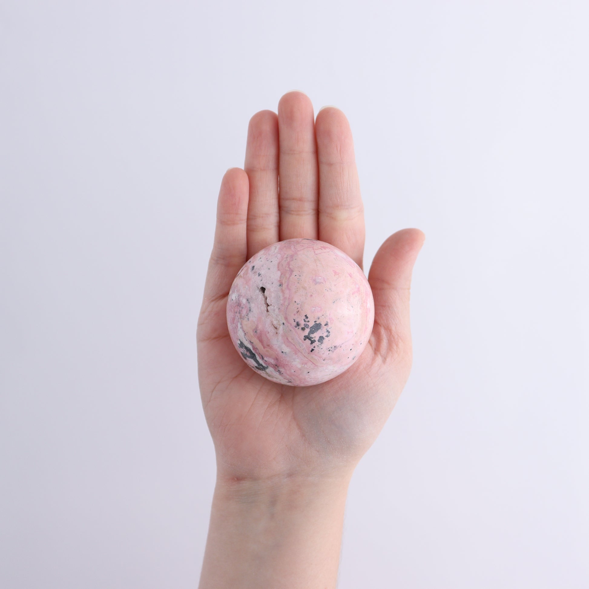 Rhodonite Spheres Set of 9 - Expert Wholesale and Supplier of Wholesale Crystals & Bulk Gemstones, ["Peru","Rhodonite","Spheres"]