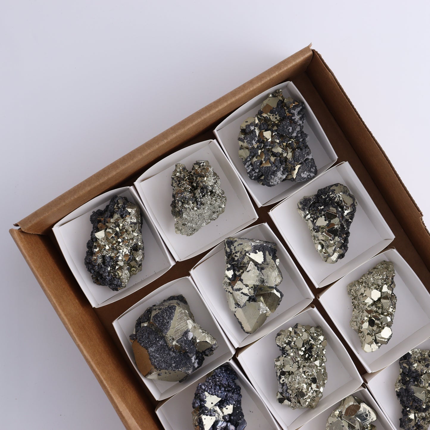 Octahedral Pyrite Clusters Set of 12 - Expert Wholesale and Supplier of Wholesale Crystals & Bulk Gemstones, ["Clusters","Octahedral Pyrite","Peru","Pyrite"]