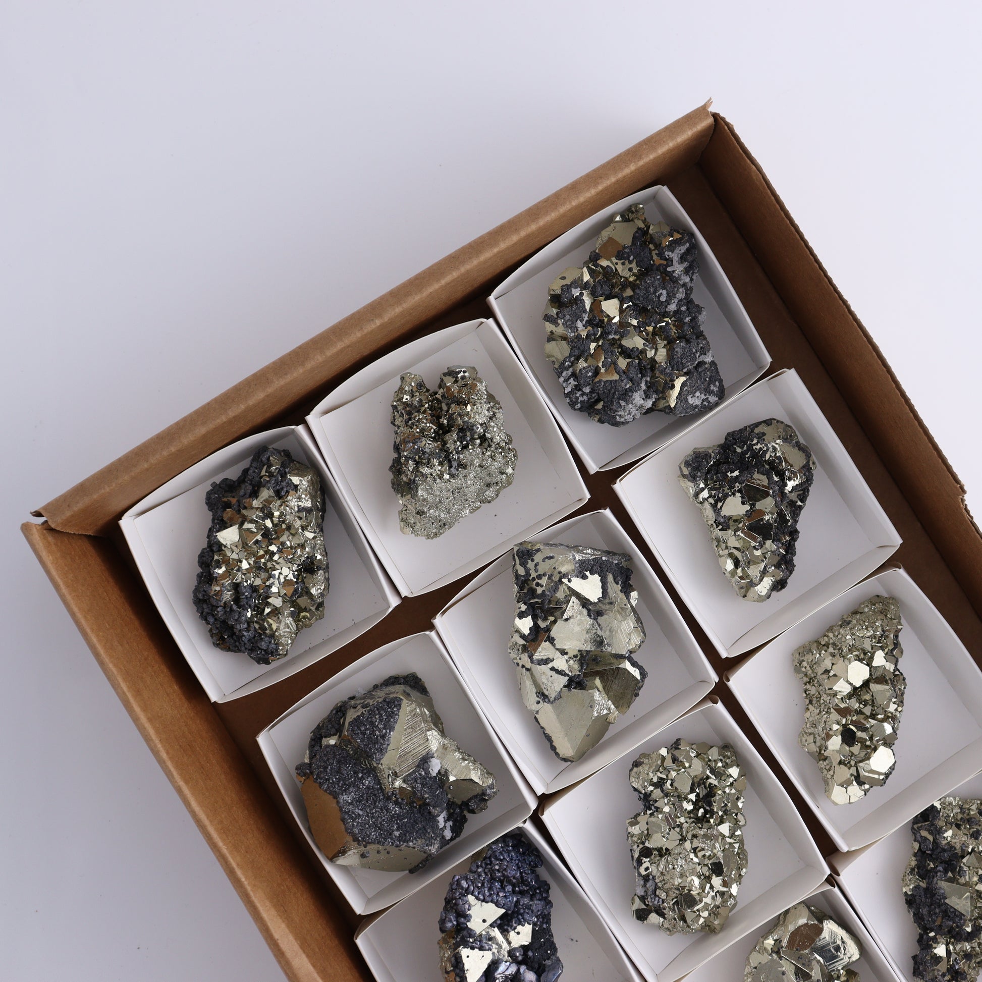 Octahedral Pyrite Clusters Set of 12 - Expert Wholesale and Supplier of Wholesale Crystals & Bulk Gemstones, ["Clusters","Octahedral Pyrite","Peru","Pyrite"]