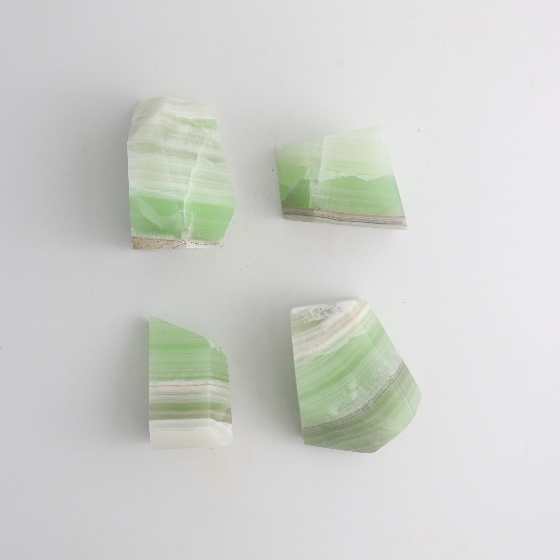 Green Calcite Freeforms - Expert Wholesale and Supplier of Wholesale Crystals & Bulk Gemstones, ["Calcite","Freeforms","Mexico"]
