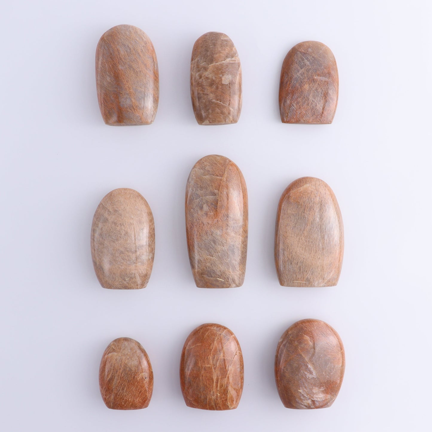 Peach Moonstone Freeform Set of 9 - Expert Wholesale and Supplier of Wholesale Crystals & Bulk Gemstones, ["Freeforms","Peach Moonstone"]