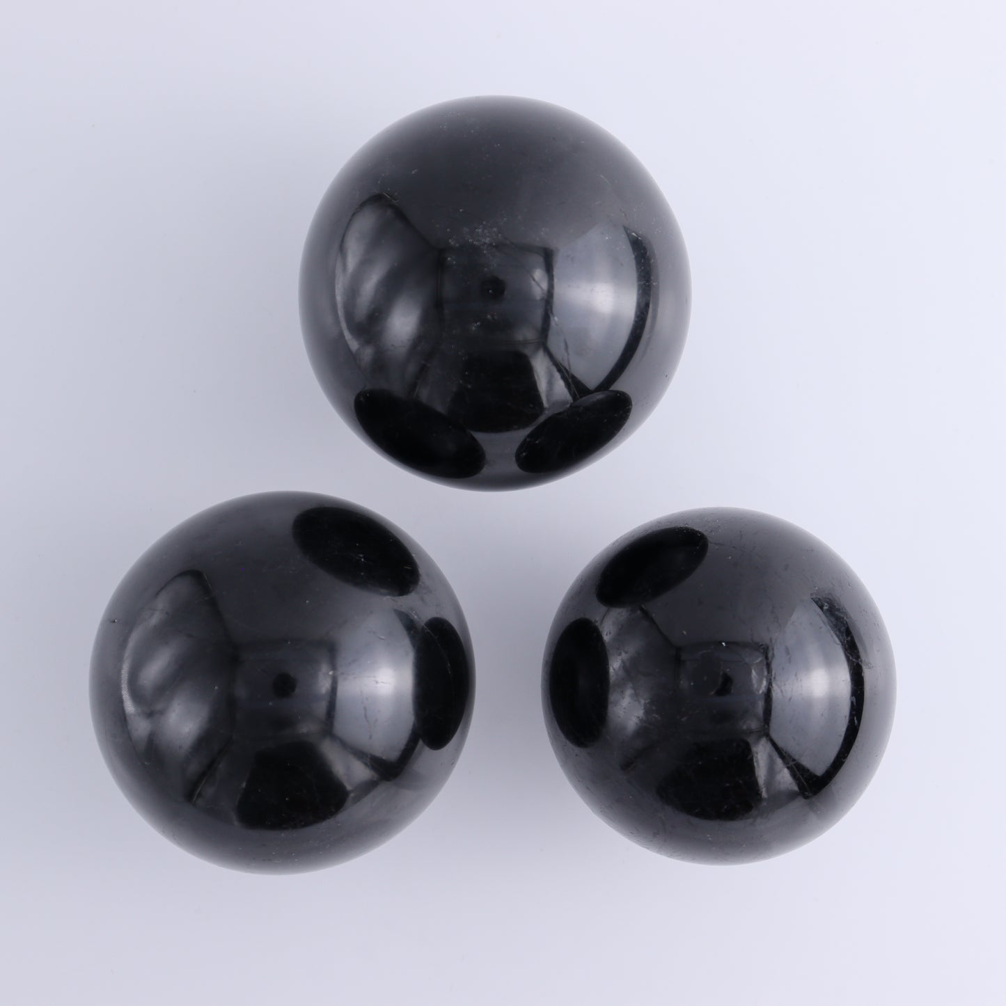 Black Tourmaline Spheres Set of 3 - Expert Wholesale and Supplier of Wholesale Crystals & Bulk Gemstones, ["Black Tourmaline","Spheres","Tourmaline"]