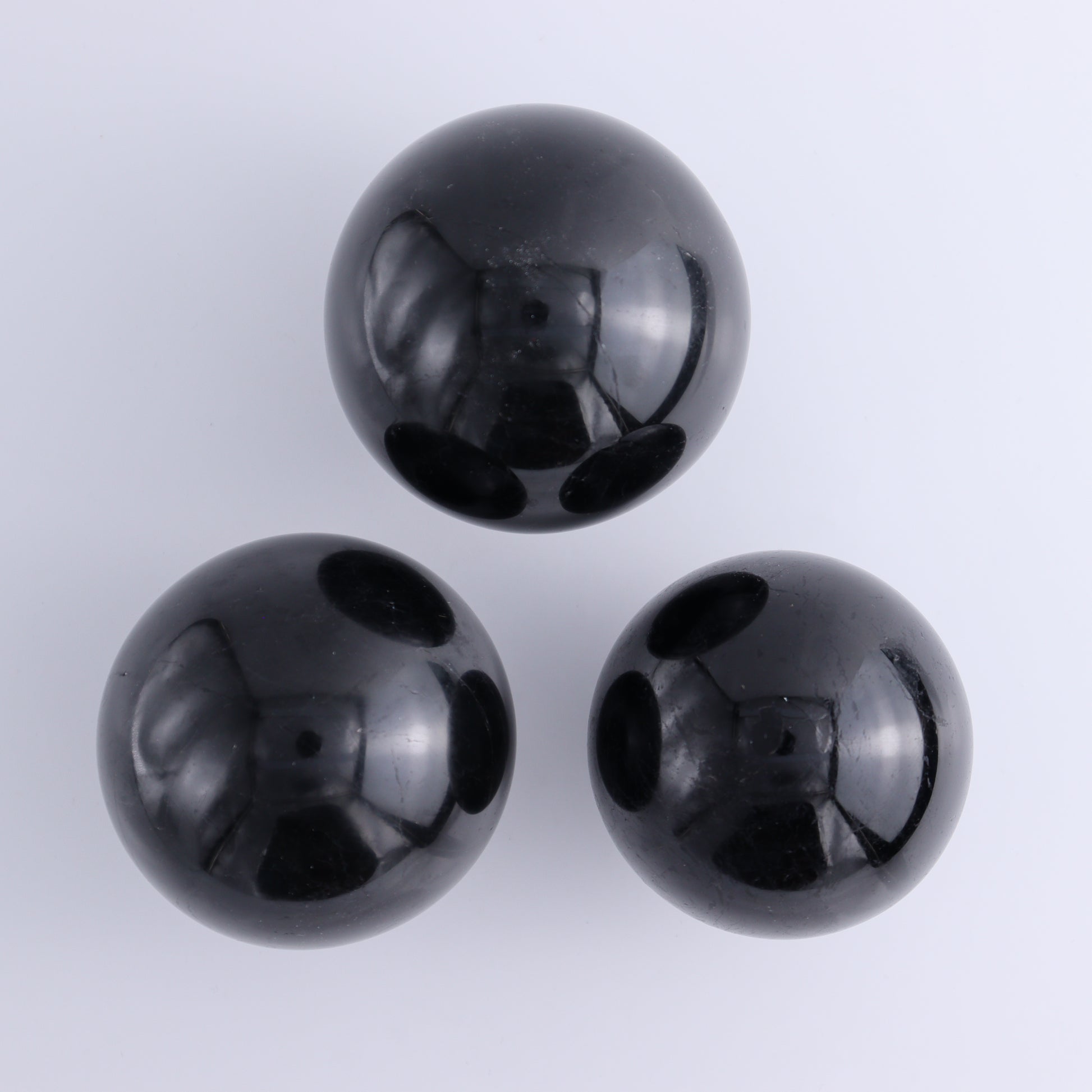 Black Tourmaline Spheres Set of 3 - Expert Wholesale and Supplier of Wholesale Crystals & Bulk Gemstones, ["Black Tourmaline","Spheres","Tourmaline"]