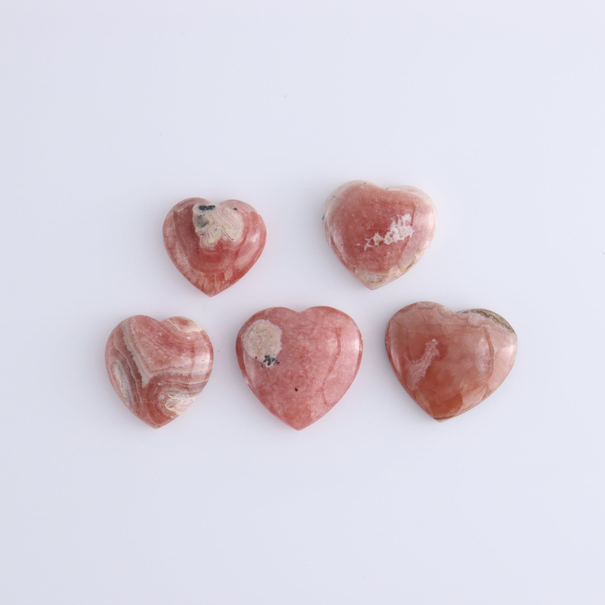 Rhodochrosite Hearts Set of 9 - Expert Wholesale and Supplier of Wholesale Crystals & Bulk Gemstones, ["Argentina","Hearts","Rhodochrosite"]