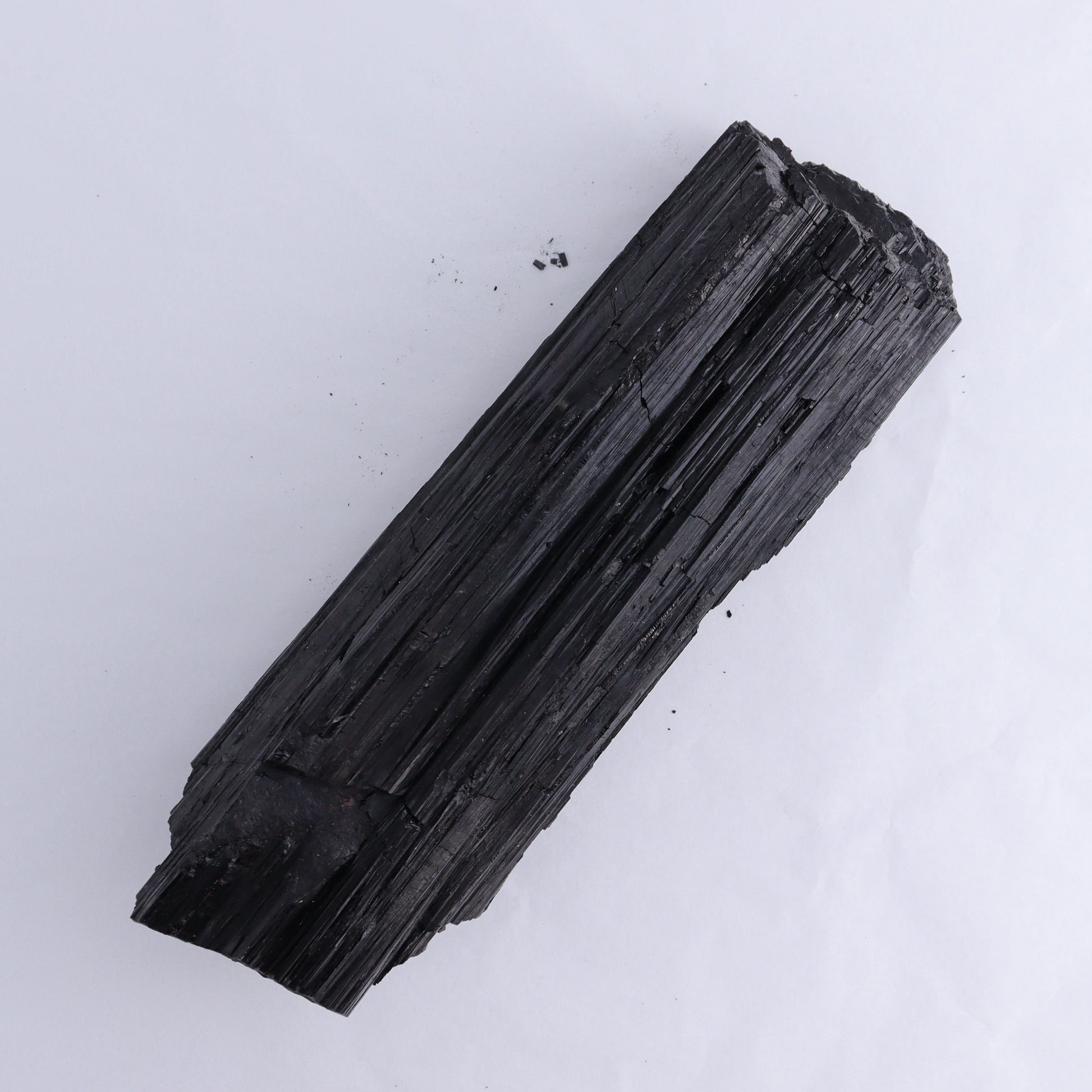 Black Tourmaline Log - Expert Wholesale and Supplier of Wholesale Crystals & Bulk Gemstones, ["Black Tourmaline","logs","Madagascar","Rough","Tourmaline"]