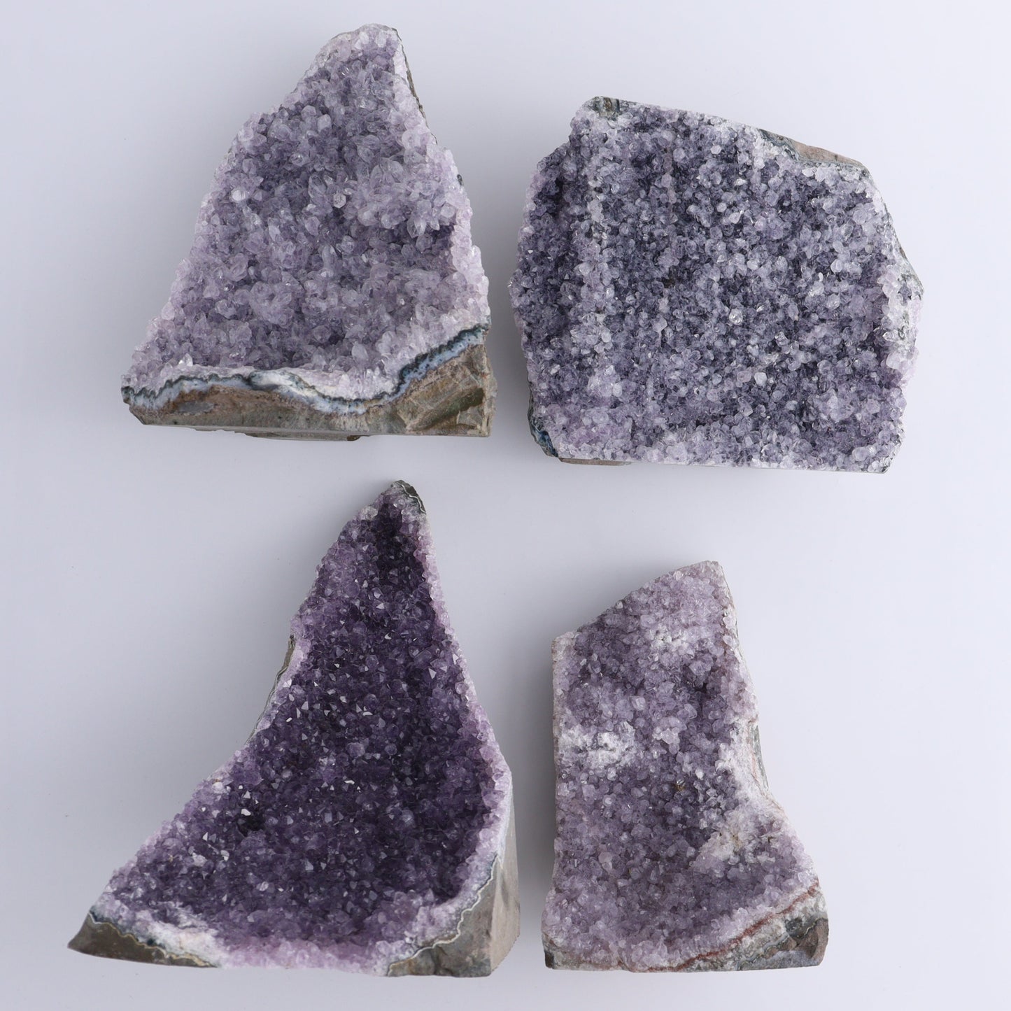 Amethyst Cut Base Set of 4 - Expert Wholesale and Supplier of Wholesale Crystals & Bulk Gemstones, ["Amethyst","Brazil","Cut Base"]