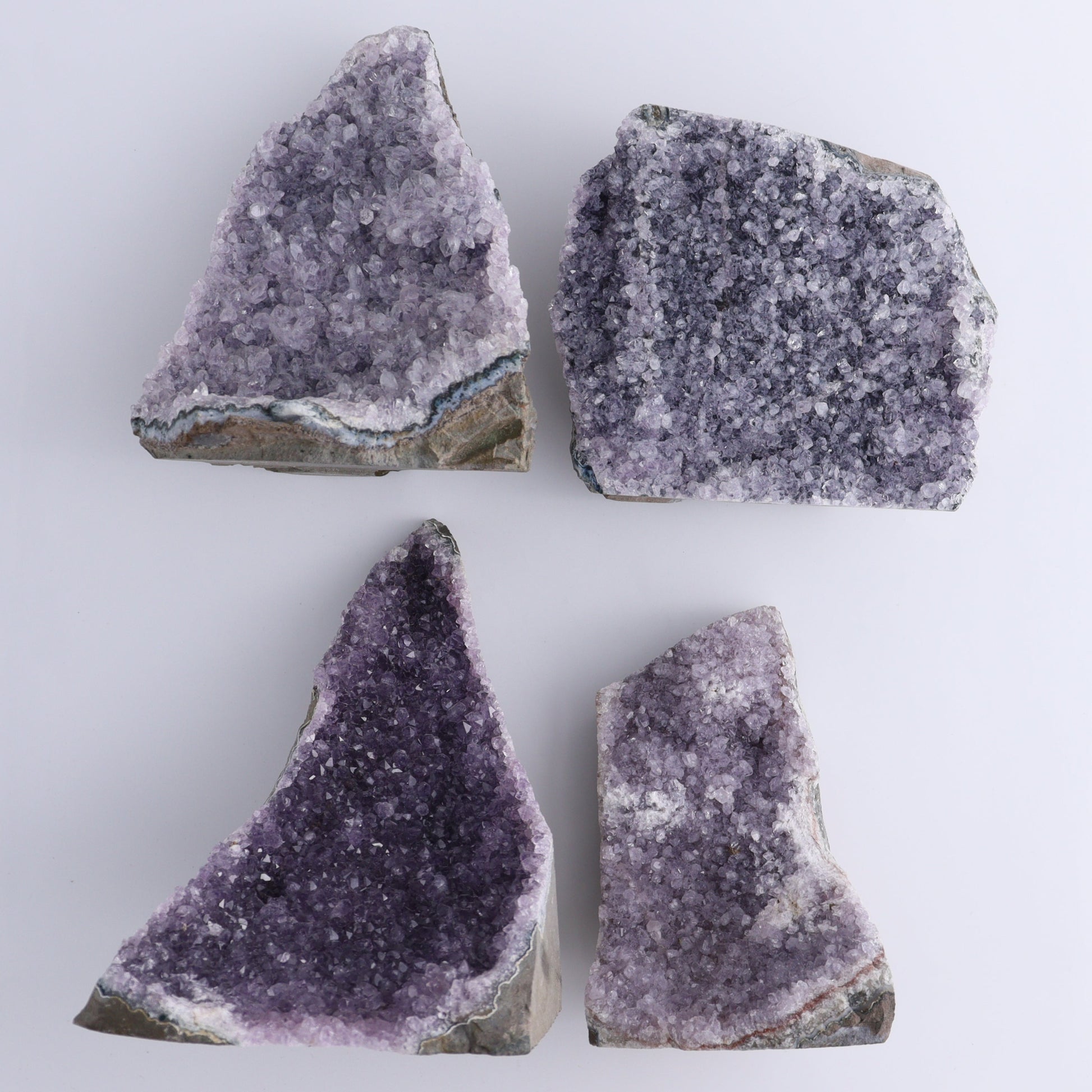 Amethyst Cut Base Set of 4 - Expert Wholesale and Supplier of Wholesale Crystals & Bulk Gemstones, ["Amethyst","Brazil","Cut Base"]