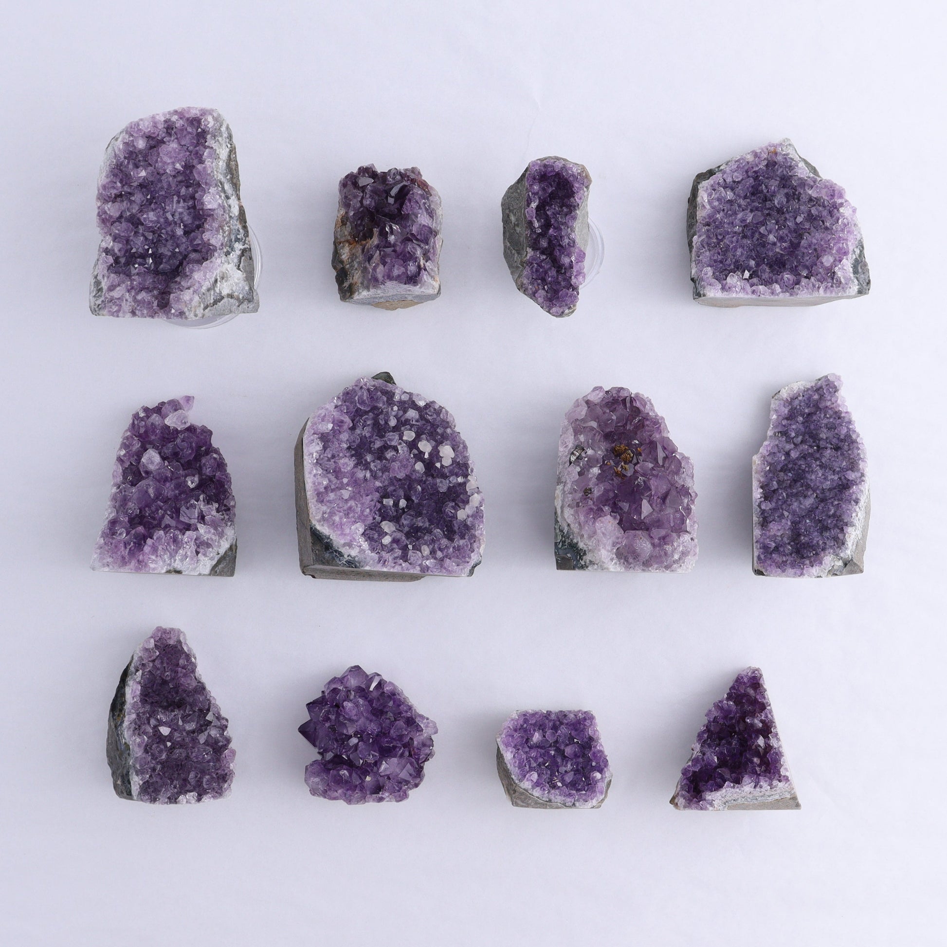 Uruguay Amethyst Cut Base Set of 12 - Expert Wholesale and Supplier of Wholesale Crystals & Bulk Gemstones, ["Amethyst","Cut Base","Uruguay"]