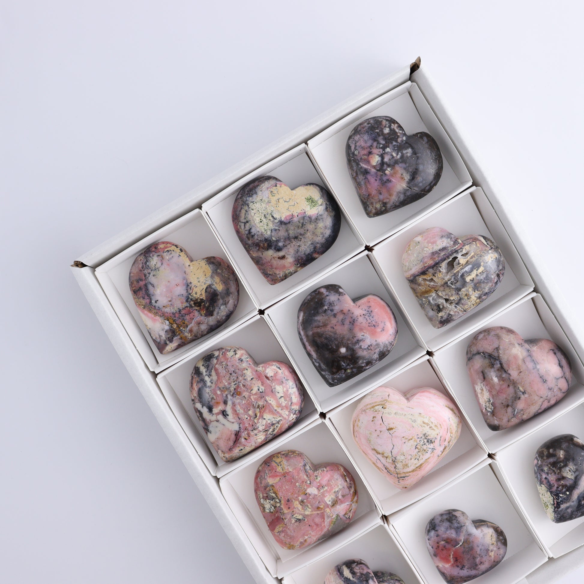 Rhodonite Hearts Set of 12 - Expert Wholesale and Supplier of Wholesale Crystals & Bulk Gemstones, ["Hearts","Peru","Rhodonite"]