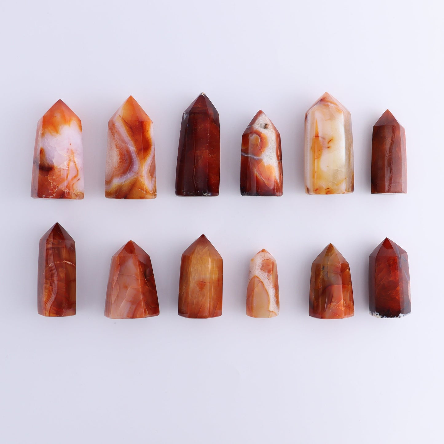 Carnelian Towers Set of 12 - Expert Wholesale and Supplier of Wholesale Crystals & Bulk Gemstones, ["carnelian","Madagascar","Towers"]