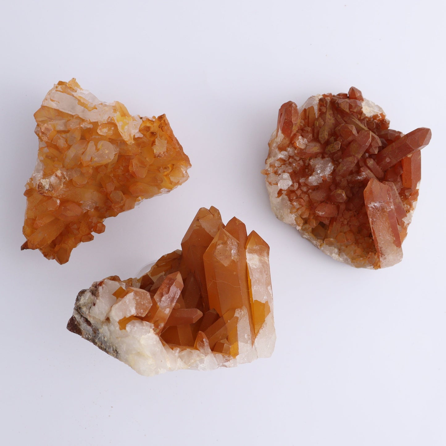 Tangerine Quartz Clusters Set of 9 - Expert Wholesale and Supplier of Wholesale Crystals & Bulk Gemstones, ["Clusters","Quartz","Tangerine Quartz"]