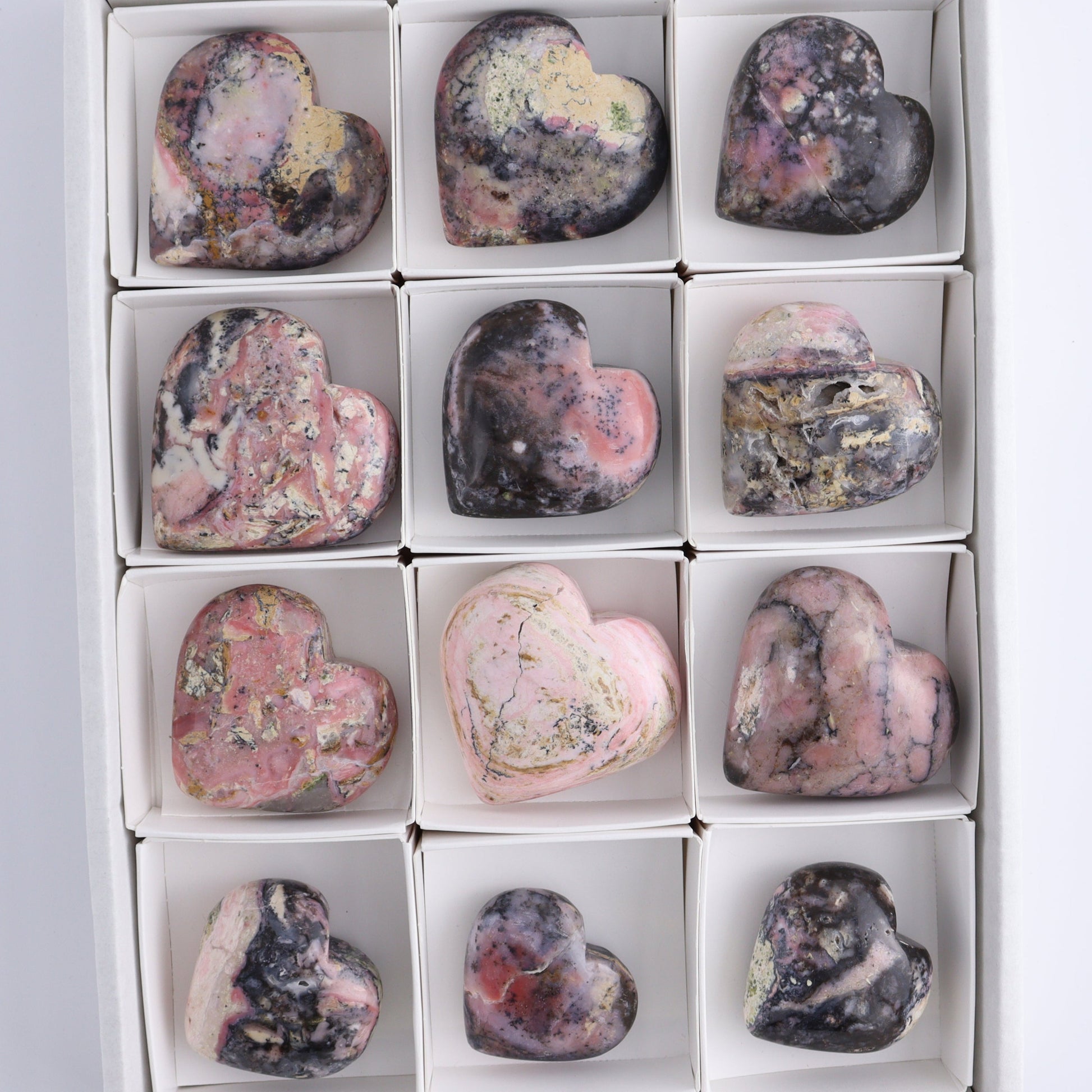 Rhodonite Hearts Set of 12 - Expert Wholesale and Supplier of Wholesale Crystals & Bulk Gemstones, ["Hearts","Peru","Rhodonite"]