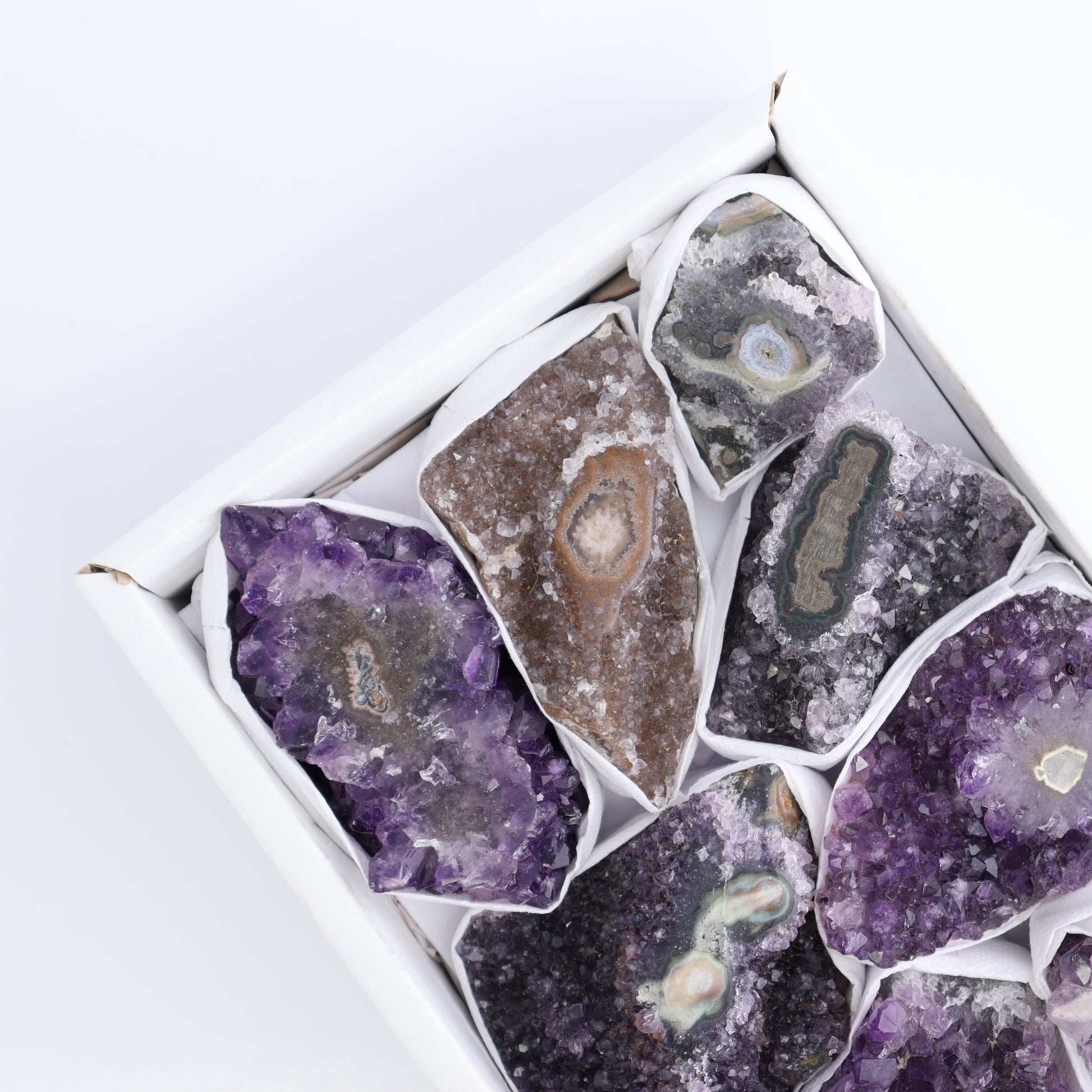 Uruguay Amethyst Clusters with "Eyes" Flat of 9 - Expert Wholesale and Supplier of Wholesale Crystals & Bulk Gemstones, ["Amethyst","Amethyst Eyes","Clusters","Uruguay"]