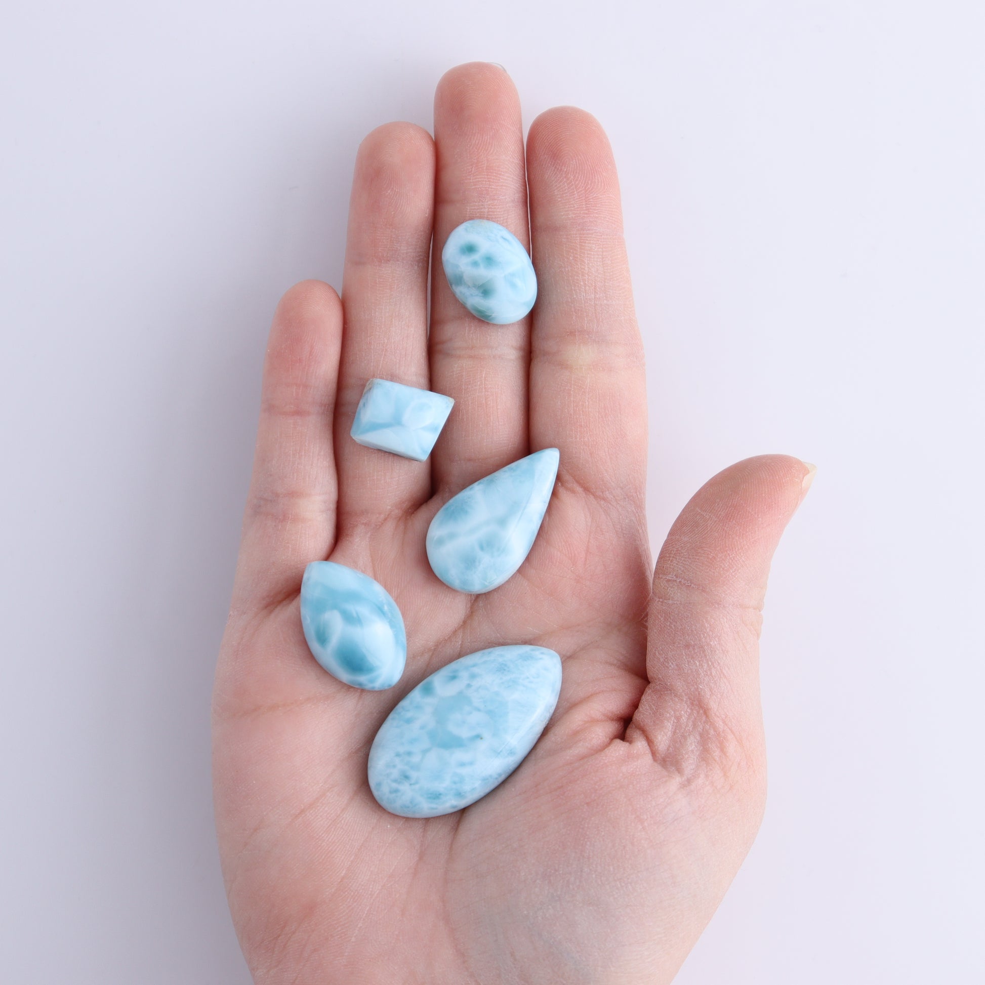 Larmiar Cabs Set of 8 - Expert Wholesale and Supplier of Wholesale Crystals & Bulk Gemstones, ["Cabs","Freeform","Freeforms","Larimar"]