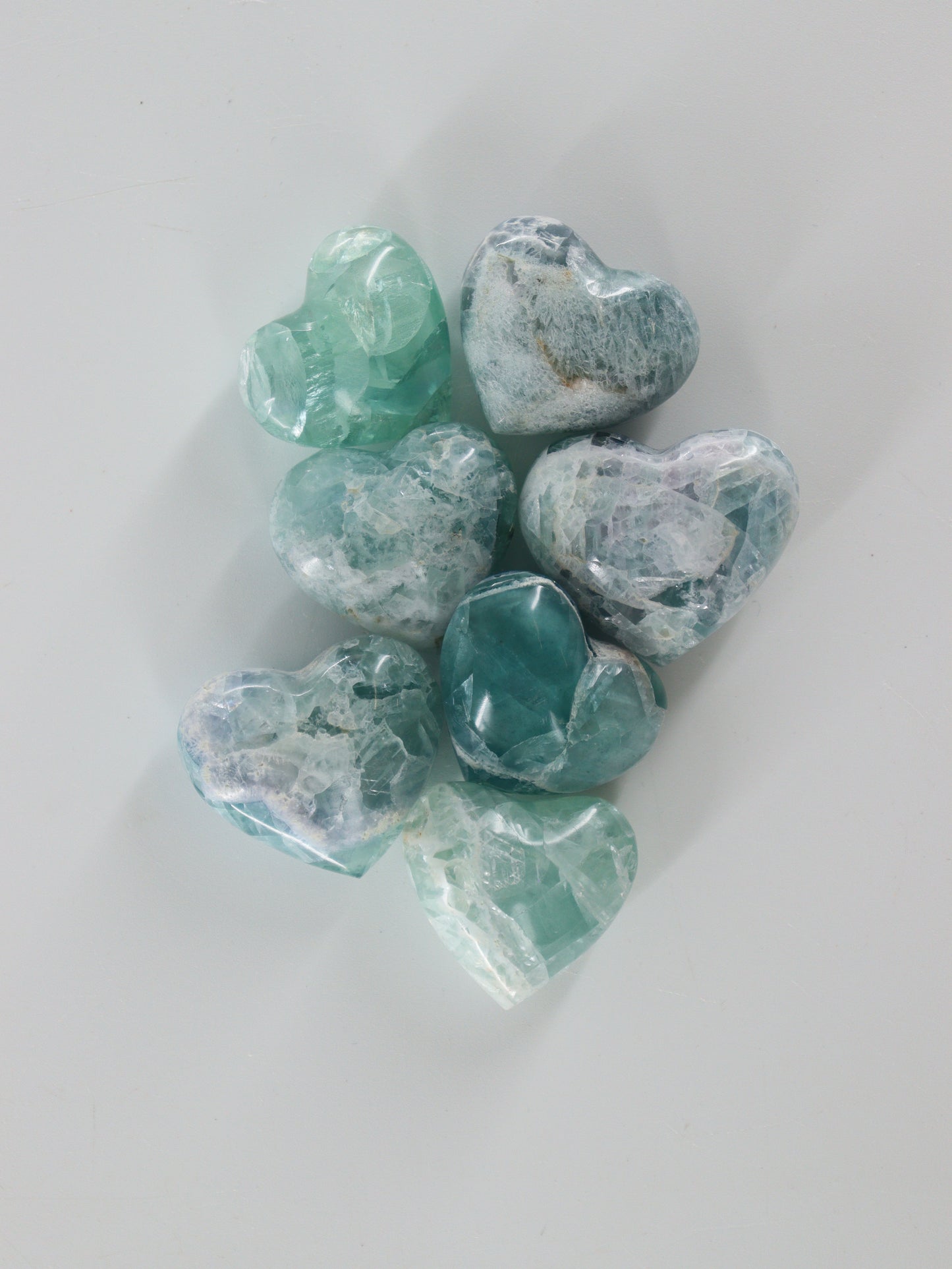 Fluorite Hearts Set of 7 - Expert Wholesale and Supplier of Wholesale Crystals & Bulk Gemstones, []