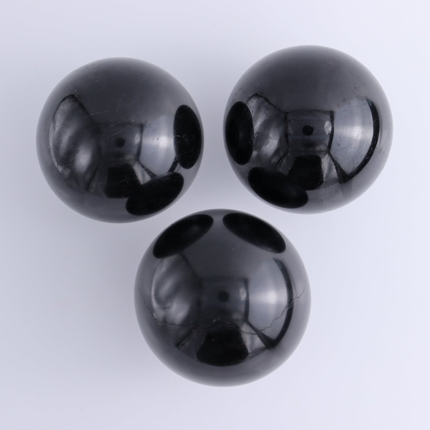 Black Tourmaline Spheres Set of 3 - Expert Wholesale and Supplier of Wholesale Crystals & Bulk Gemstones, ["Black Tourmaline","Spheres","Tourmaline"]