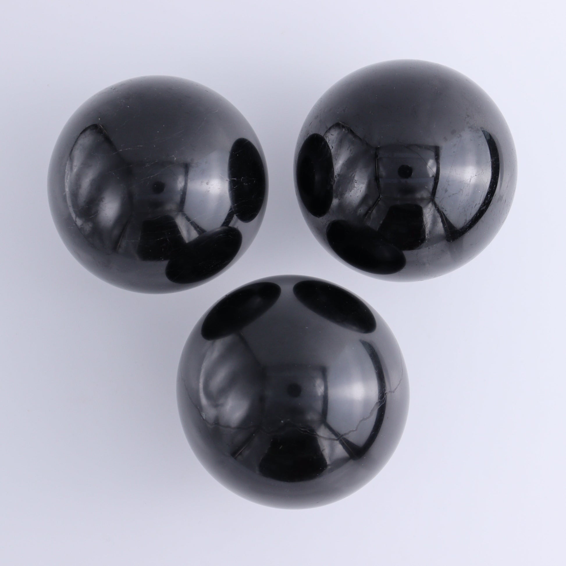 Black Tourmaline Spheres Set of 3 - Expert Wholesale and Supplier of Wholesale Crystals & Bulk Gemstones, ["Black Tourmaline","Spheres","Tourmaline"]