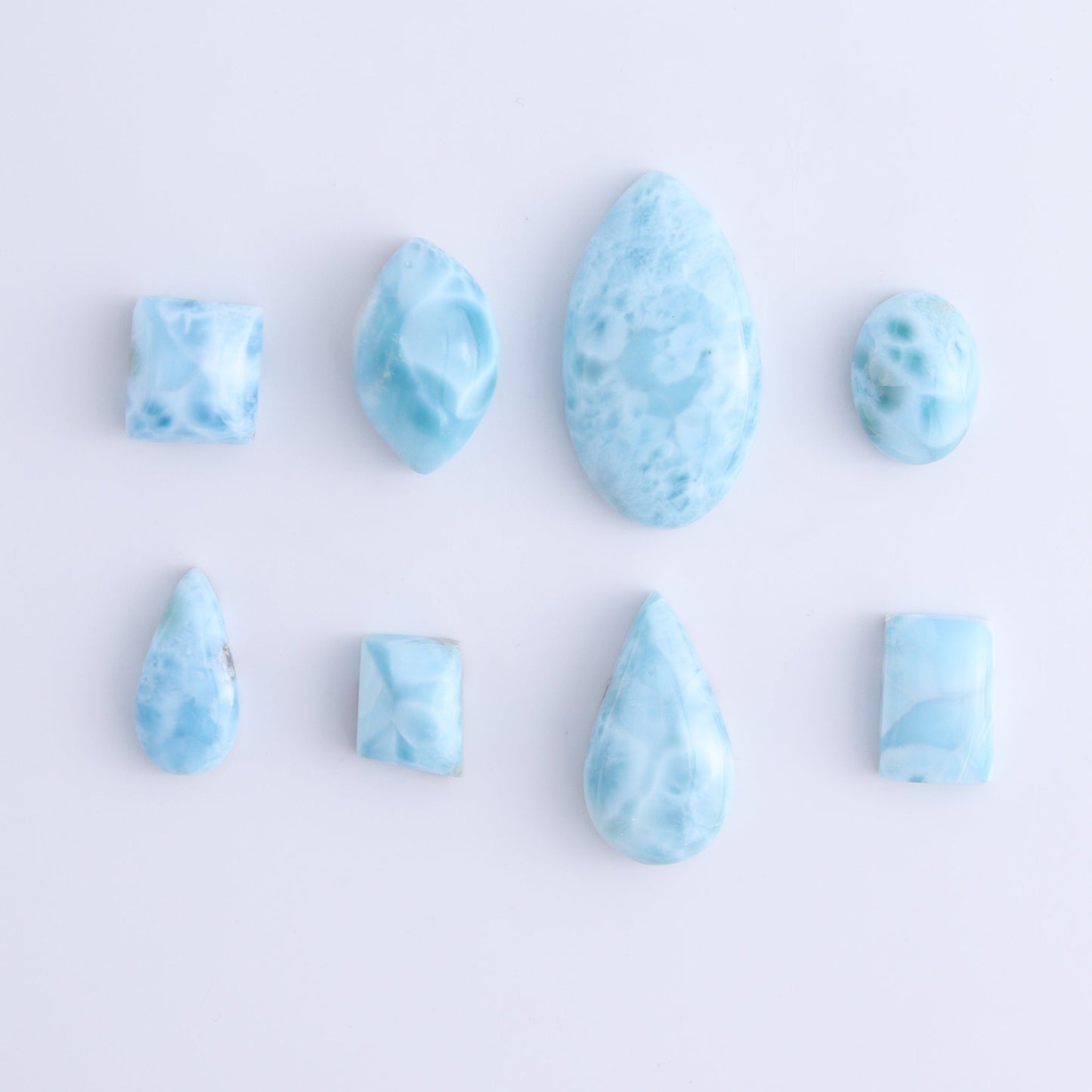 Larmiar Cabs Set of 8 - Expert Wholesale and Supplier of Wholesale Crystals & Bulk Gemstones, ["Cabs","Freeform","Freeforms","Larimar"]