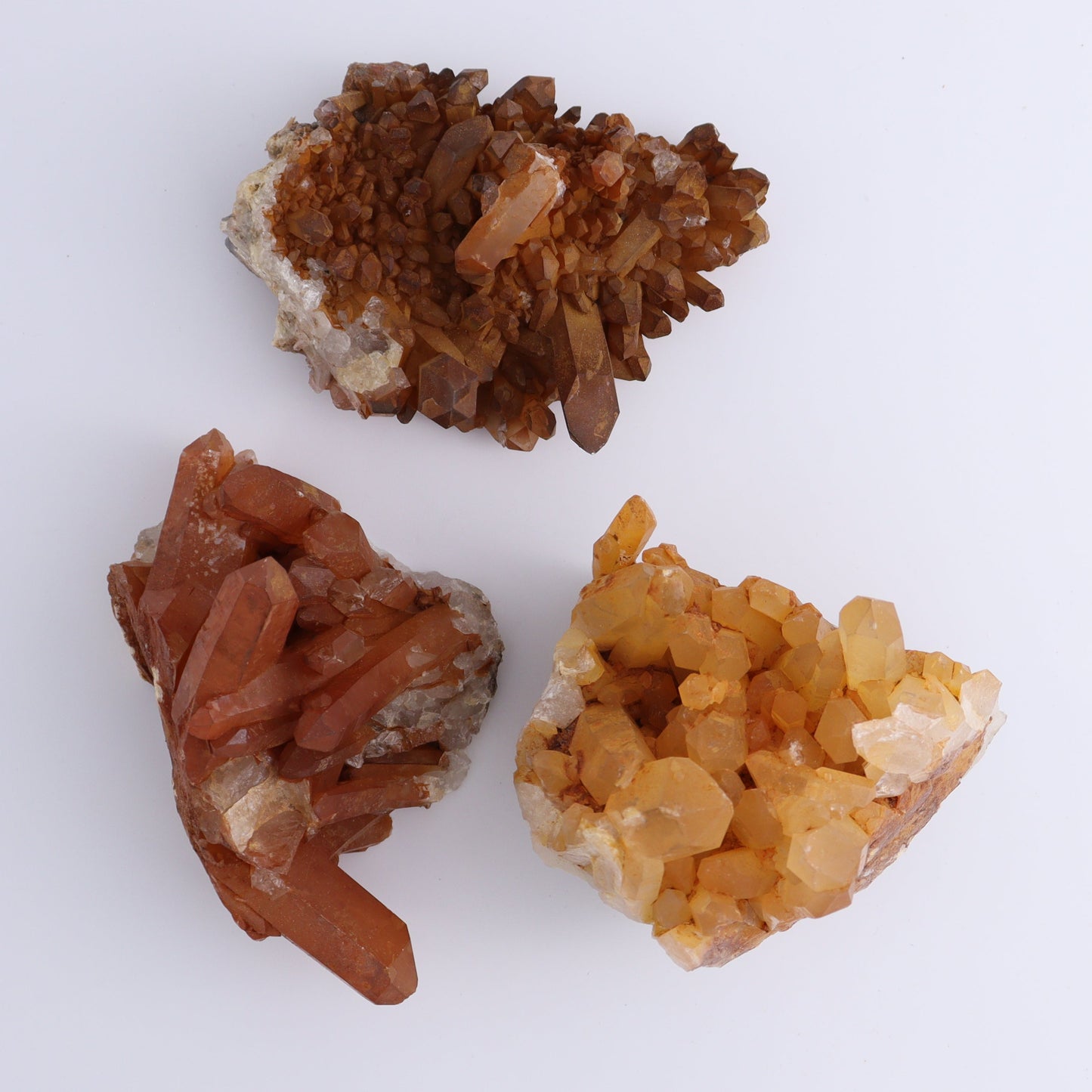 Tangerine Quartz Clusters Set of 9 - Expert Wholesale and Supplier of Wholesale Crystals & Bulk Gemstones, ["Clusters","Quartz","Tangerine Quartz"]