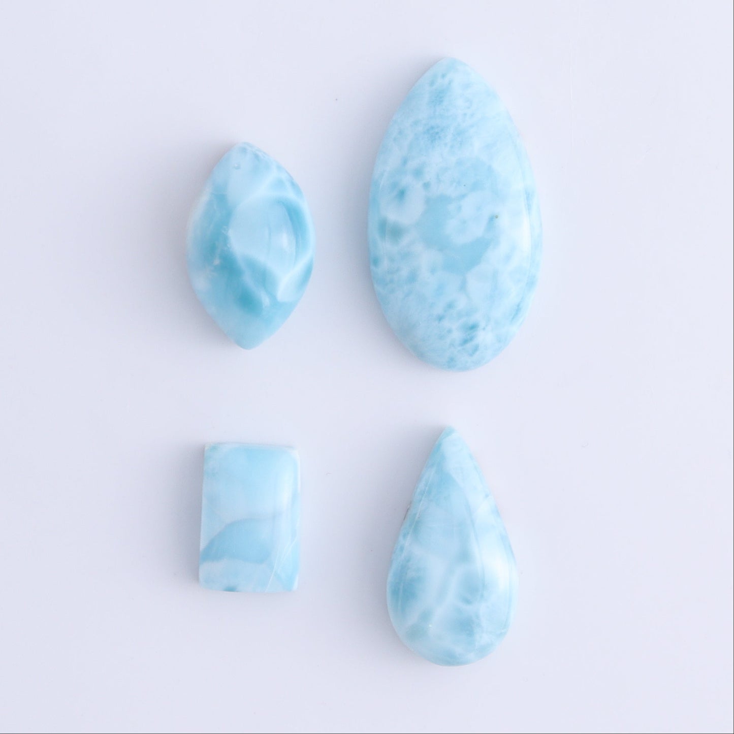 Larmiar Cabs Set of 8 - Expert Wholesale and Supplier of Wholesale Crystals & Bulk Gemstones, ["Cabs","Freeform","Freeforms","Larimar"]