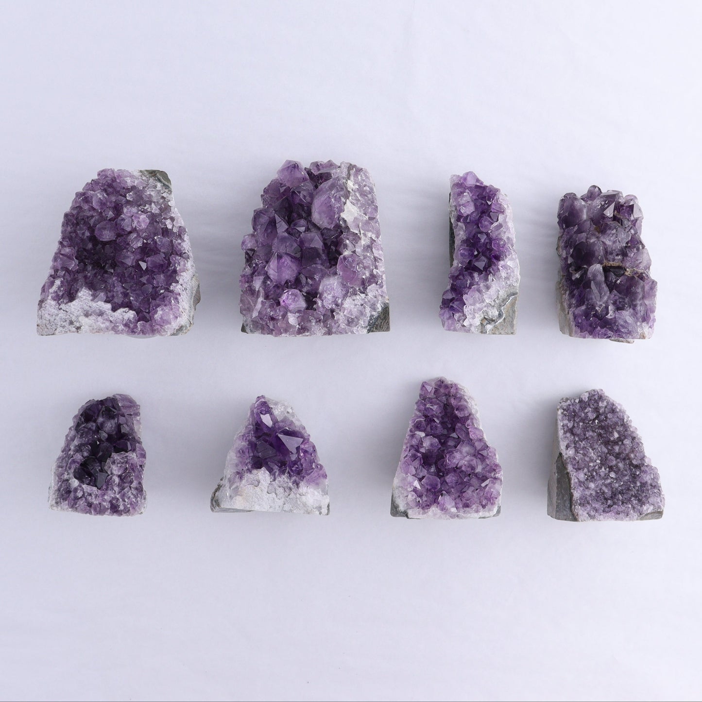 Uruguay Amethyst Cut Base Set of 8 - Expert Wholesale and Supplier of Wholesale Crystals & Bulk Gemstones, ["Amethyst","Cut Base","Uruguay"]