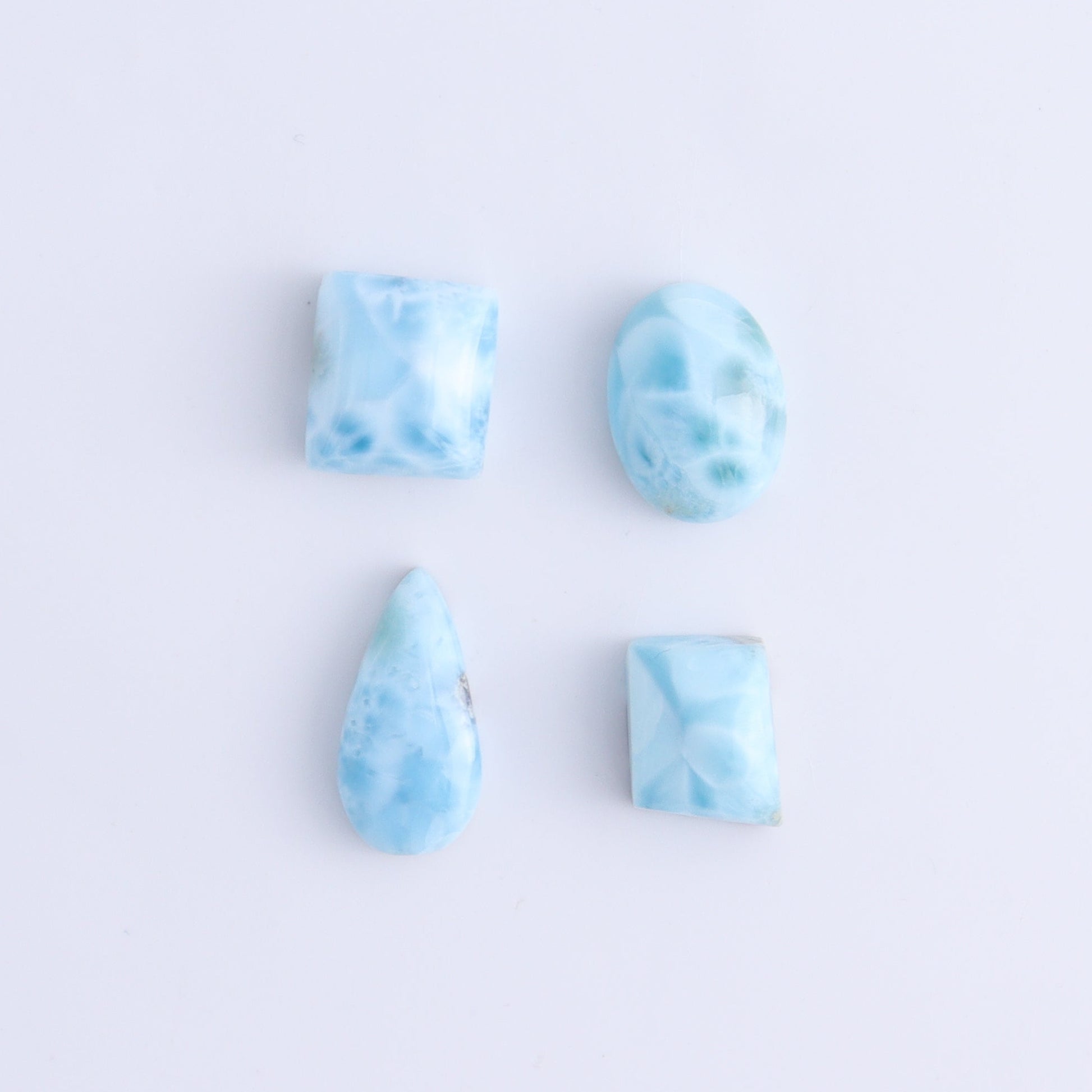 Larmiar Cabs Set of 8 - Expert Wholesale and Supplier of Wholesale Crystals & Bulk Gemstones, ["Cabs","Freeform","Freeforms","Larimar"]