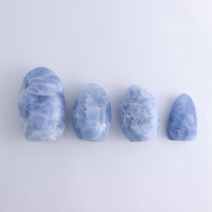 Blue Calcite Set of 4 - Expert Wholesale and Supplier of Wholesale Crystals & Bulk Gemstones, ["Blue Calcite","Calcite","Freeform","Madagascar"]