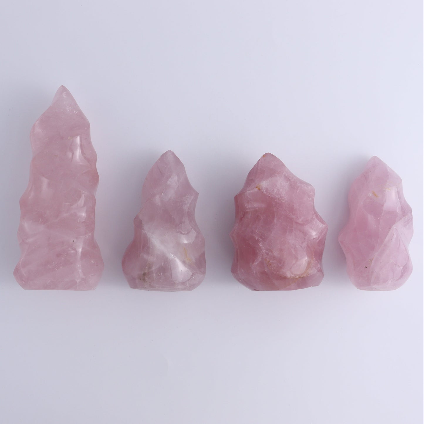 Rose Quartz Flames Set of 4 - Expert Wholesale and Supplier of Wholesale Crystals & Bulk Gemstones, ["flames","Madagascar","Quartz","Rose Quartz"]