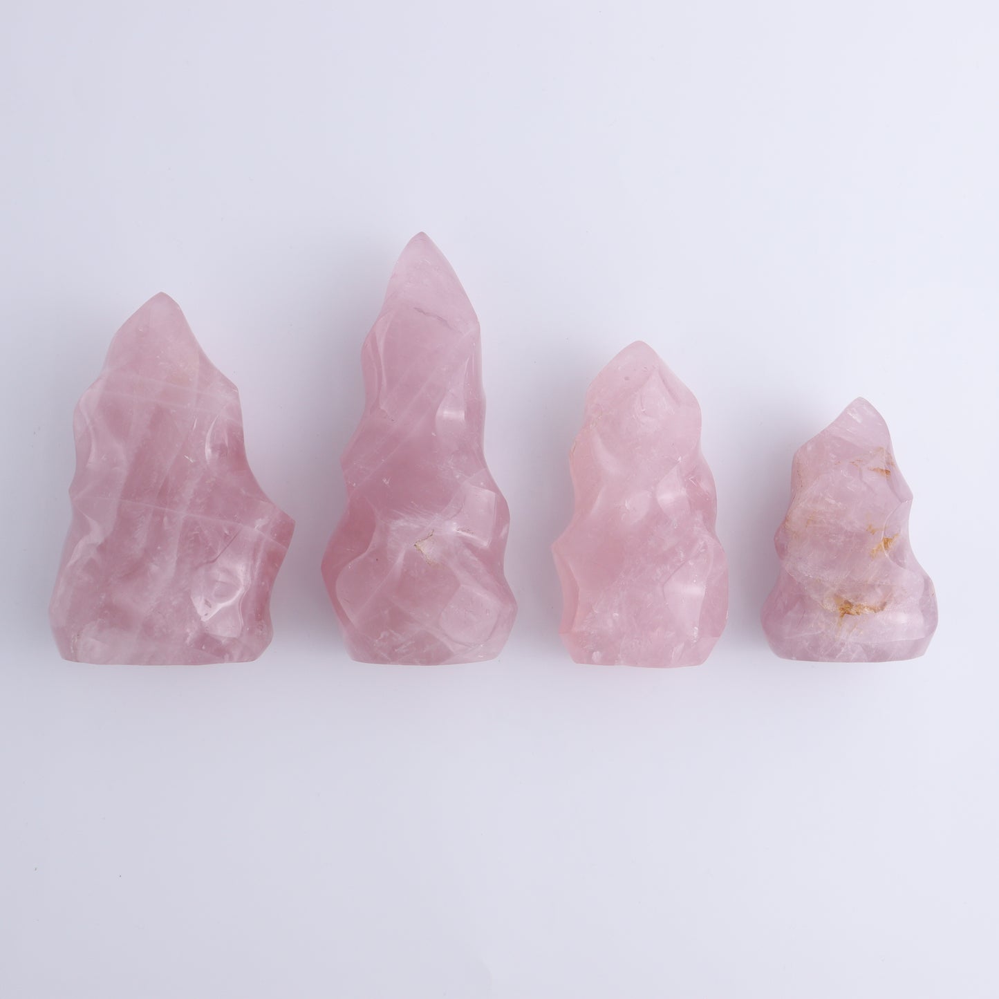 Rose Quartz Flames Set of 4 - Expert Wholesale and Supplier of Wholesale Crystals & Bulk Gemstones, ["flames","Madagascar","Quartz","Rose Quartz"]