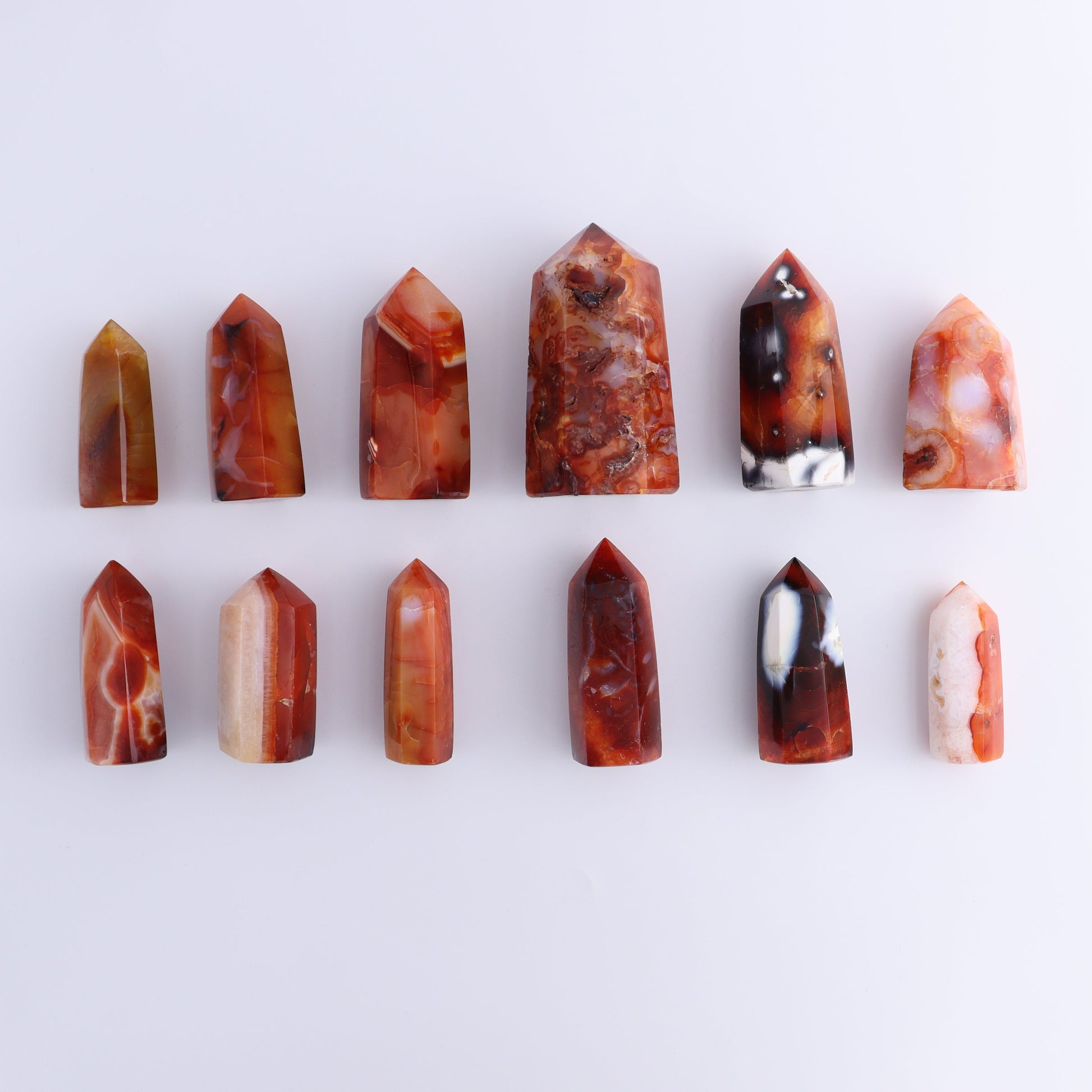 Carnelian Towers Set of 12 - Expert Wholesale and Supplier of Wholesale Crystals & Bulk Gemstones, ["carnelian","Madagascar","Towers"]