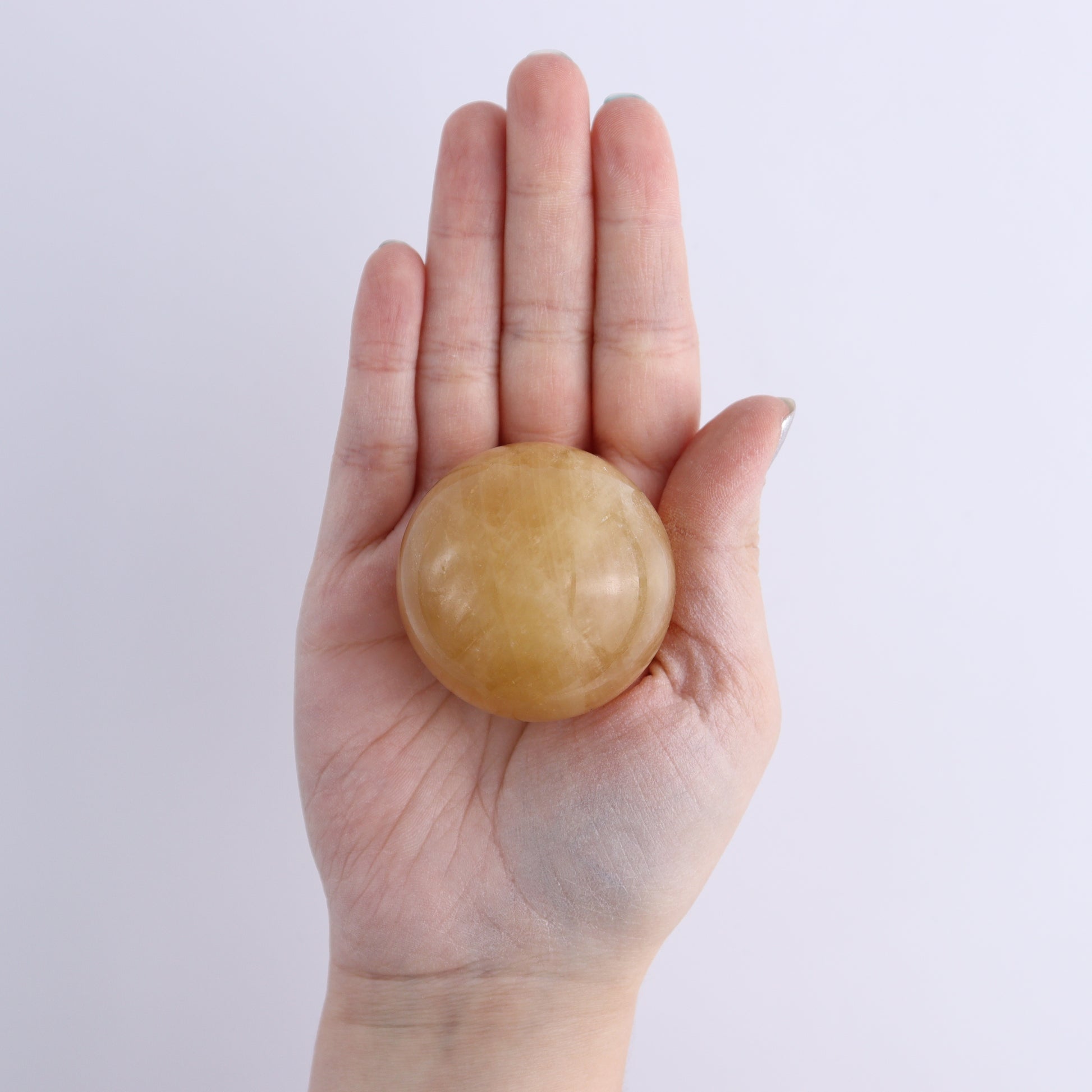 Calcite Spheres Set of 9 - Expert Wholesale and Supplier of Wholesale Crystals & Bulk Gemstones, ["Calcite","Mexico","Spheres"]