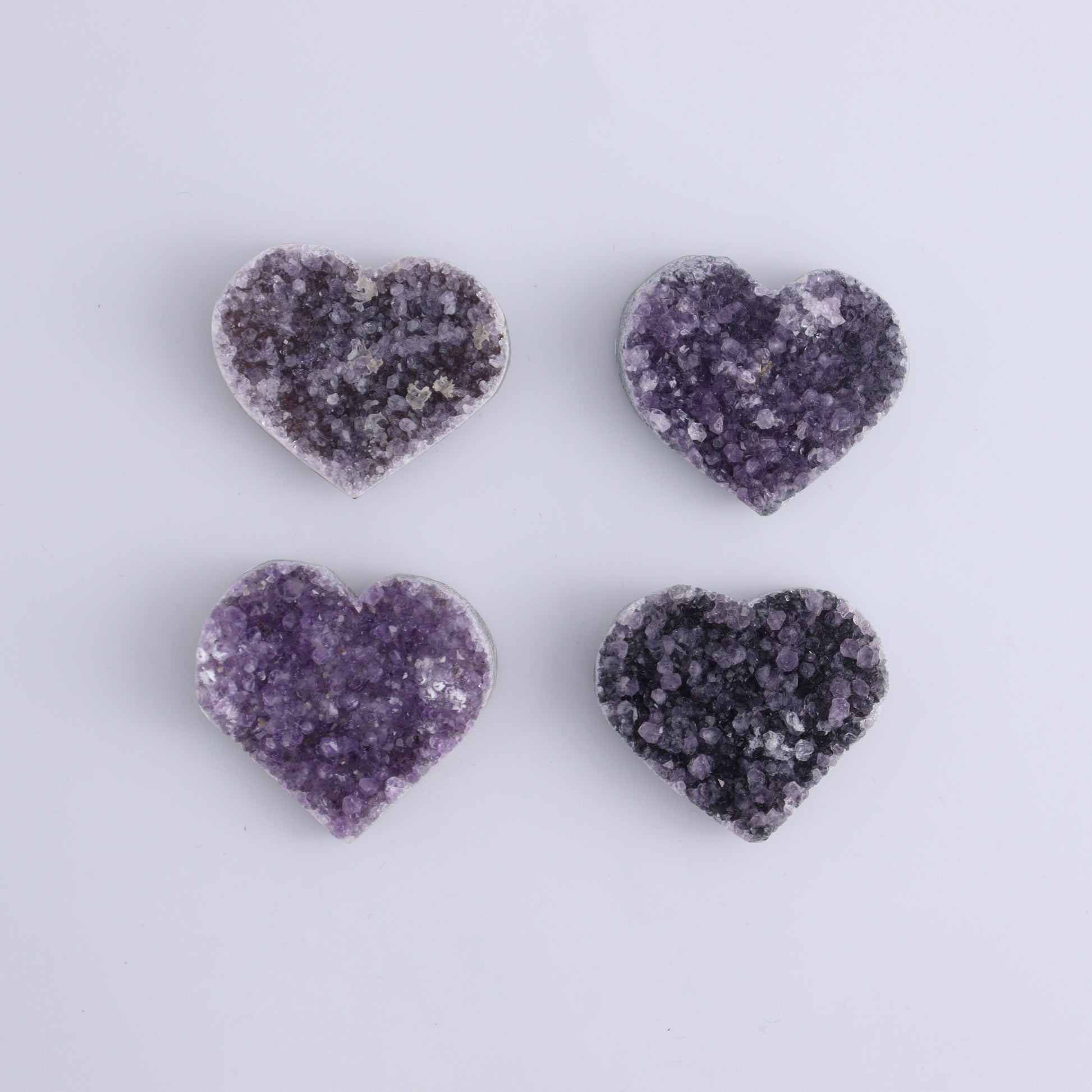 Amethyst Hearts Set of 8 - Expert Wholesale and Supplier of Wholesale Crystals & Bulk Gemstones, ["Amethyst","Hearts","Uruguay"]
