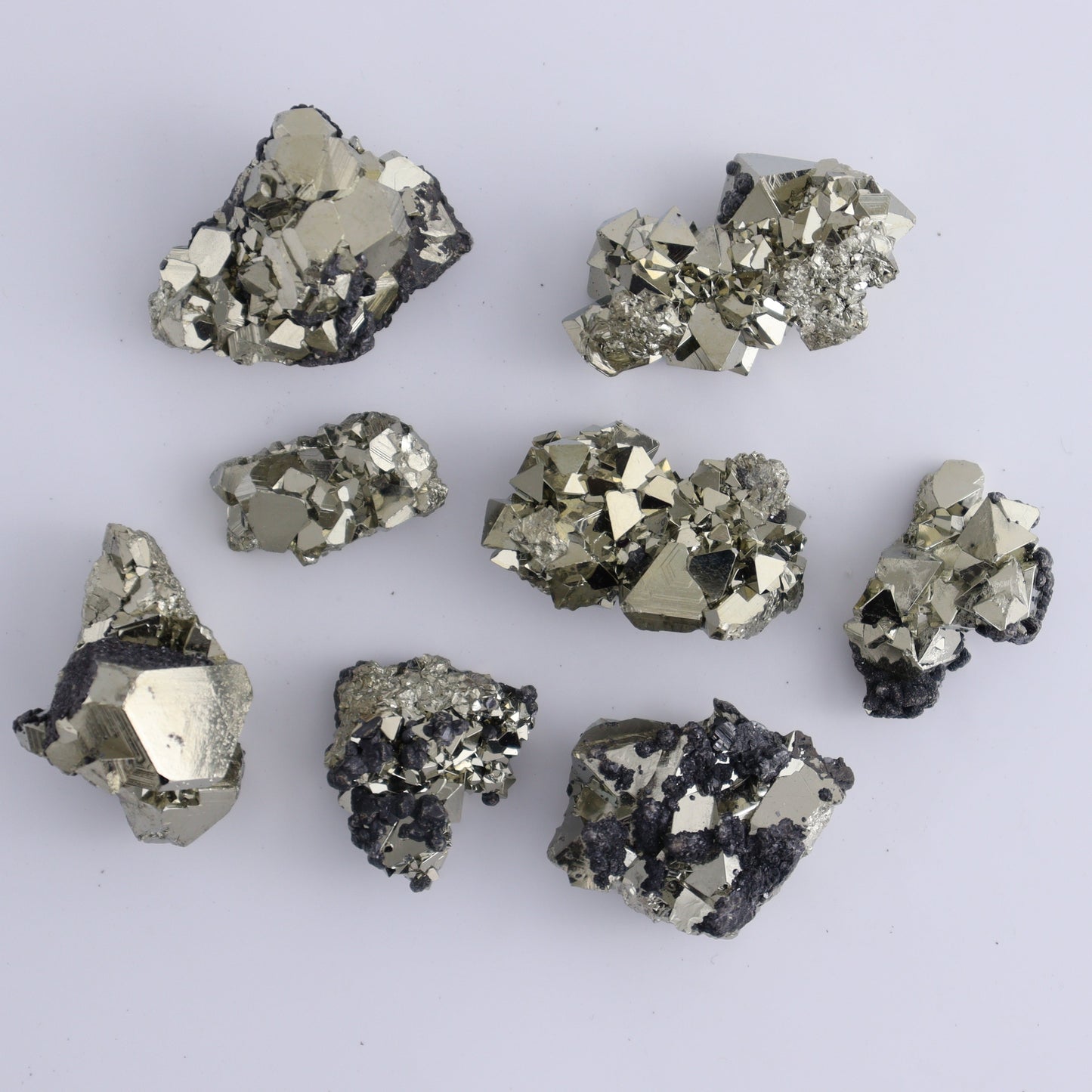 Octahedral Pyrite Clusters Set of 22 - Expert Wholesale and Supplier of Wholesale Crystals & Bulk Gemstones, ["Clusters","Octahedral Pyrite","Peru","Pyrite"]