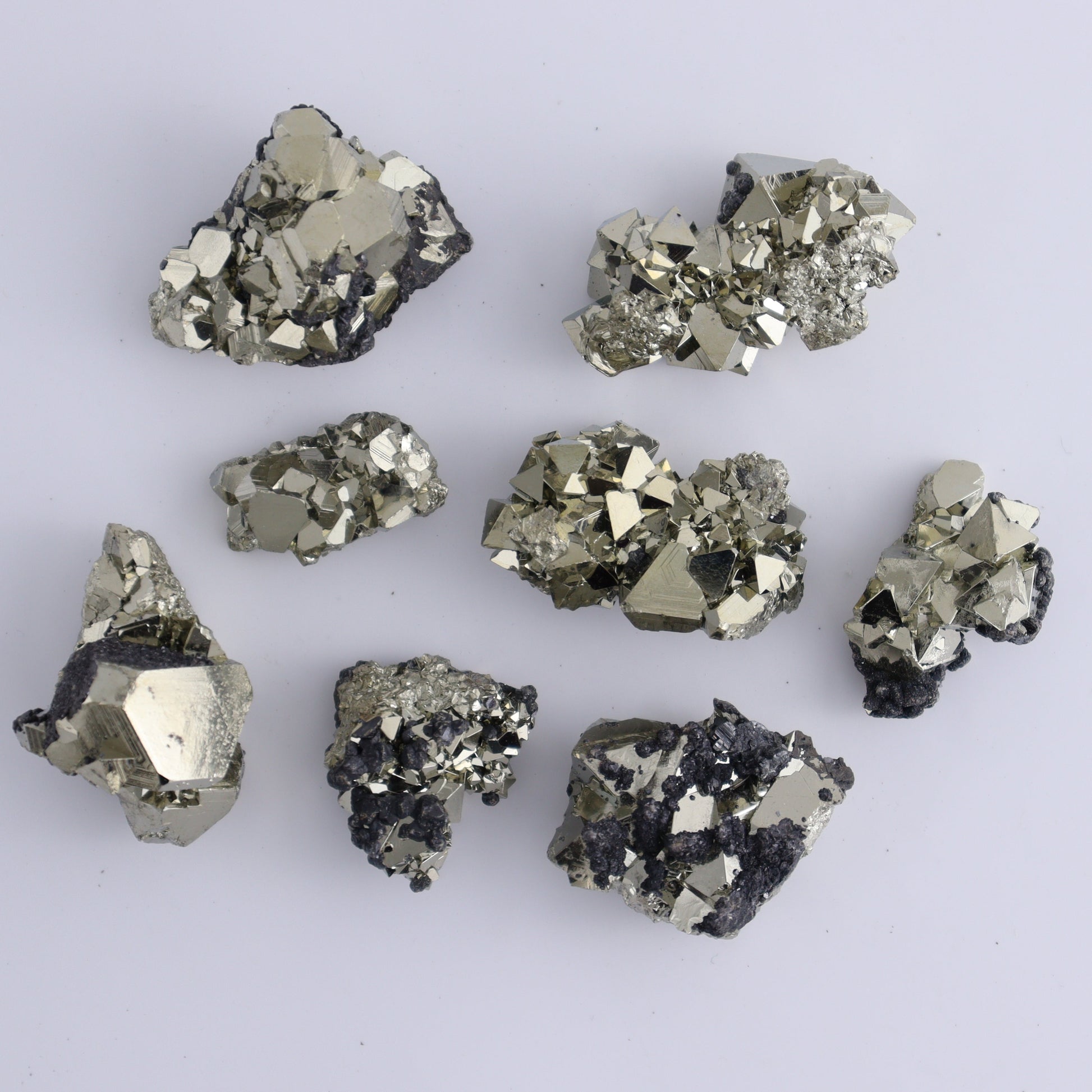 Octahedral Pyrite Clusters Set of 22 - Expert Wholesale and Supplier of Wholesale Crystals & Bulk Gemstones, ["Clusters","Octahedral Pyrite","Peru","Pyrite"]