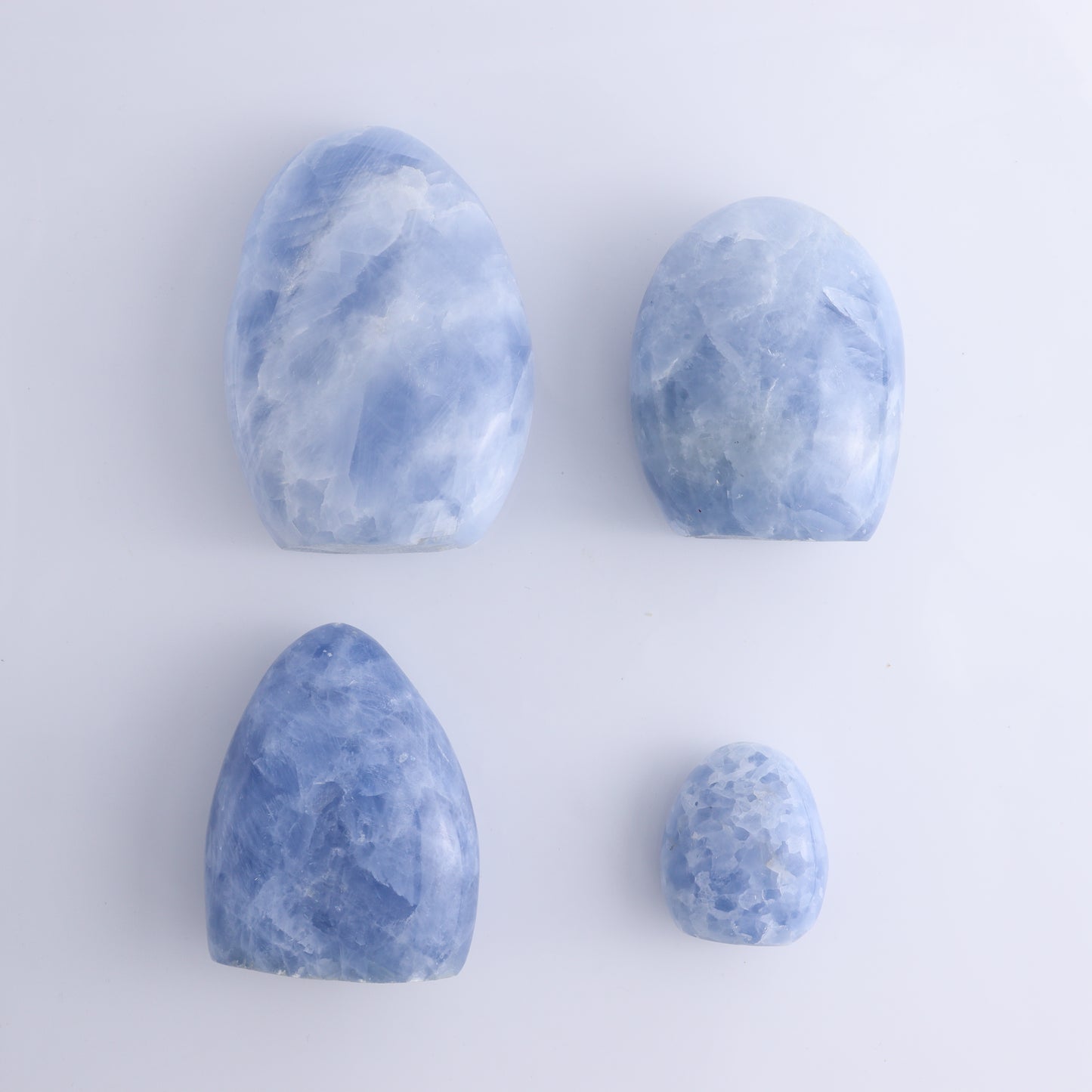 Blue Calcite Set of 4 - Expert Wholesale and Supplier of Wholesale Crystals & Bulk Gemstones, ["Blue Calcite","Calcite","Freeform","Madagascar"]