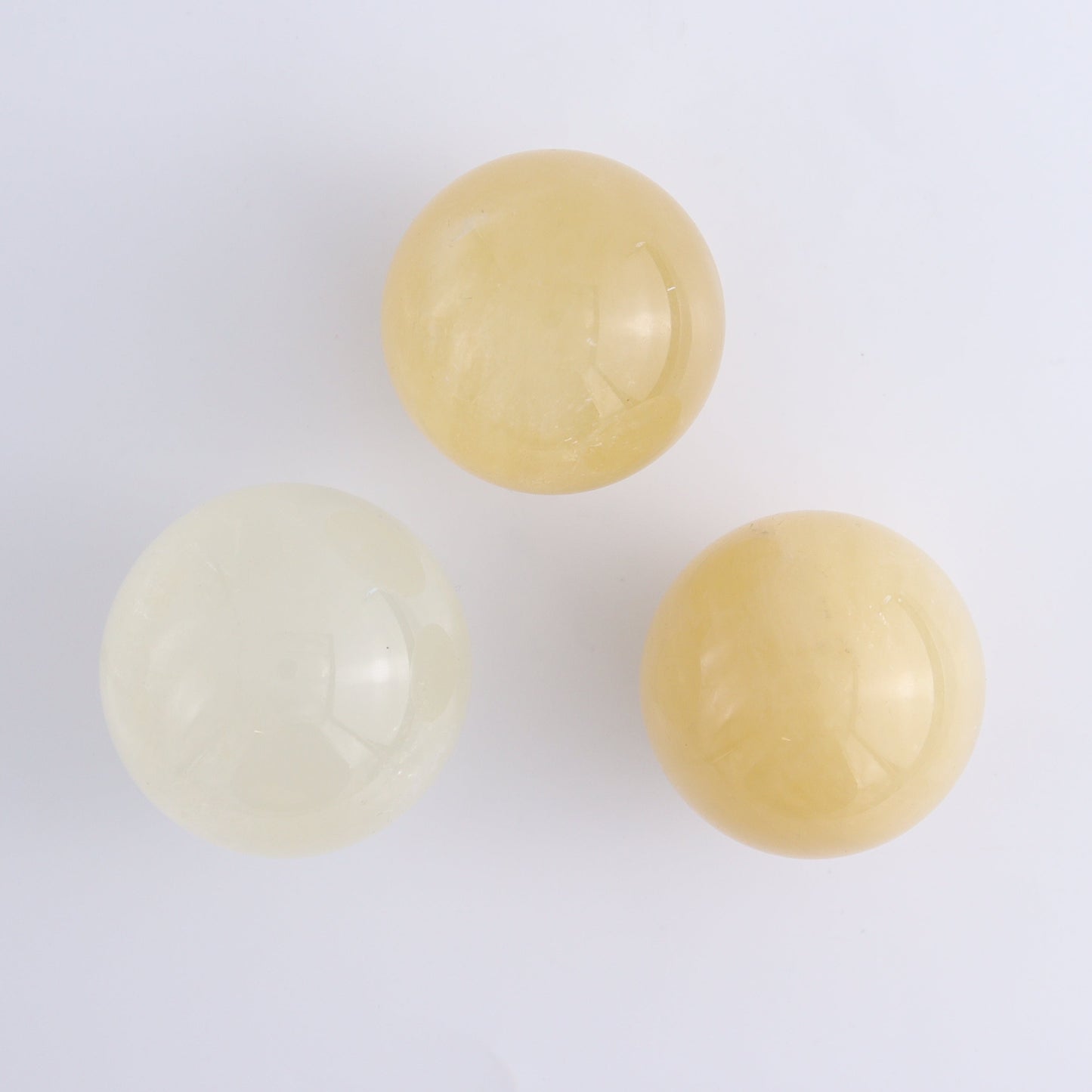 Calcite Spheres Set of 9 - Expert Wholesale and Supplier of Wholesale Crystals & Bulk Gemstones, ["Calcite","Mexico","Spheres"]