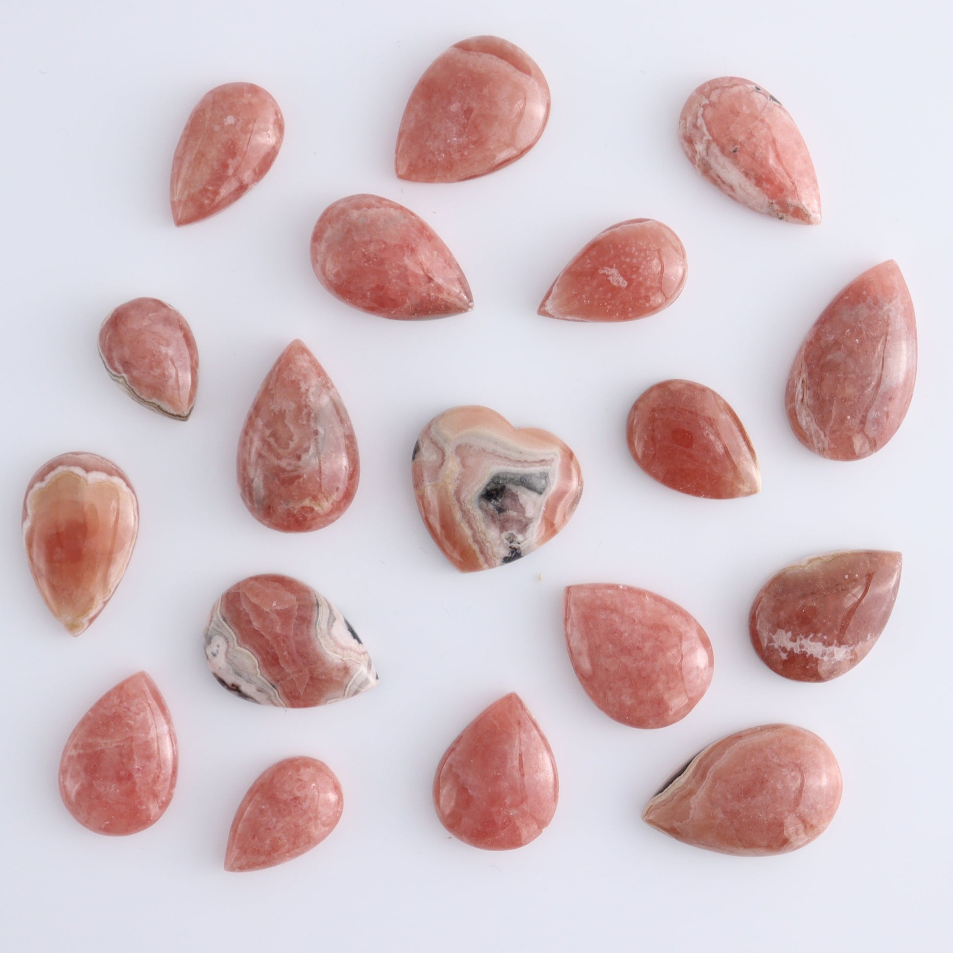 Rhodochrosite Cabs and Heart Set of 18 - Expert Wholesale and Supplier of Wholesale Crystals & Bulk Gemstones, ["Argentina","Cabs","Rhodochrosite"]